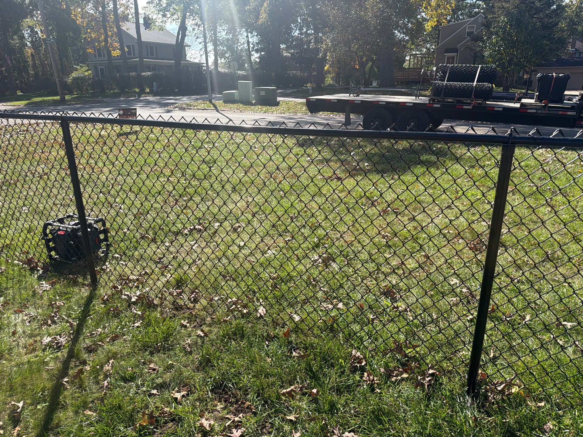 Residential Black Chain Link Fencing in Cedar Falls by Perfect Picket Fence and Stain