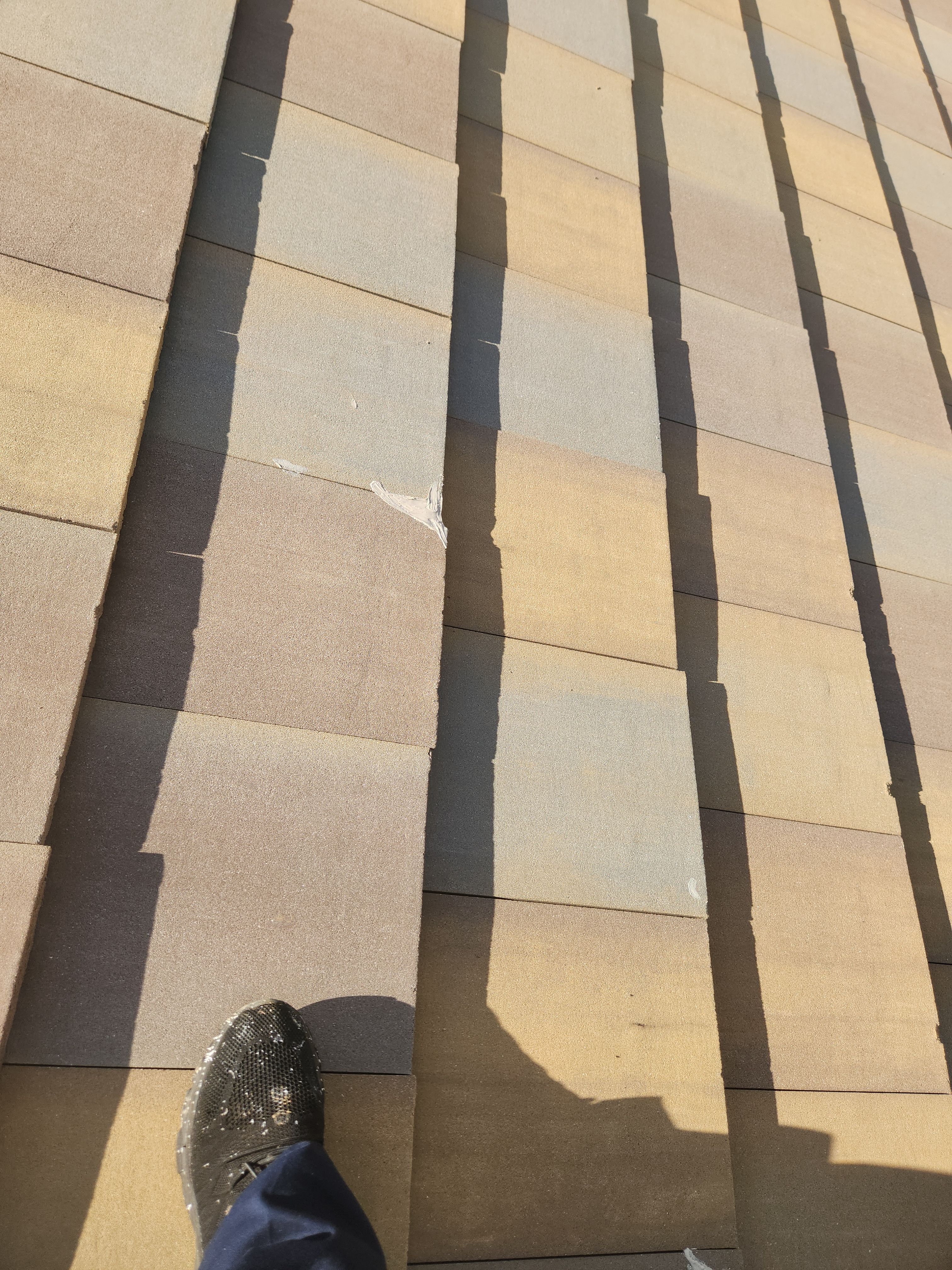 Concrete Tile Roof Repair for Residential Home in Wellington by Aastro Roofing