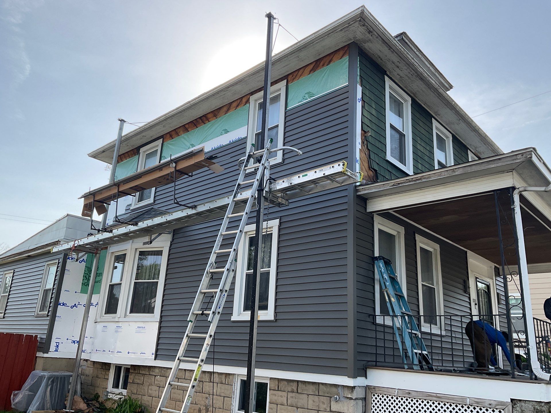 New siding & New Gutters by Alpha Design Services