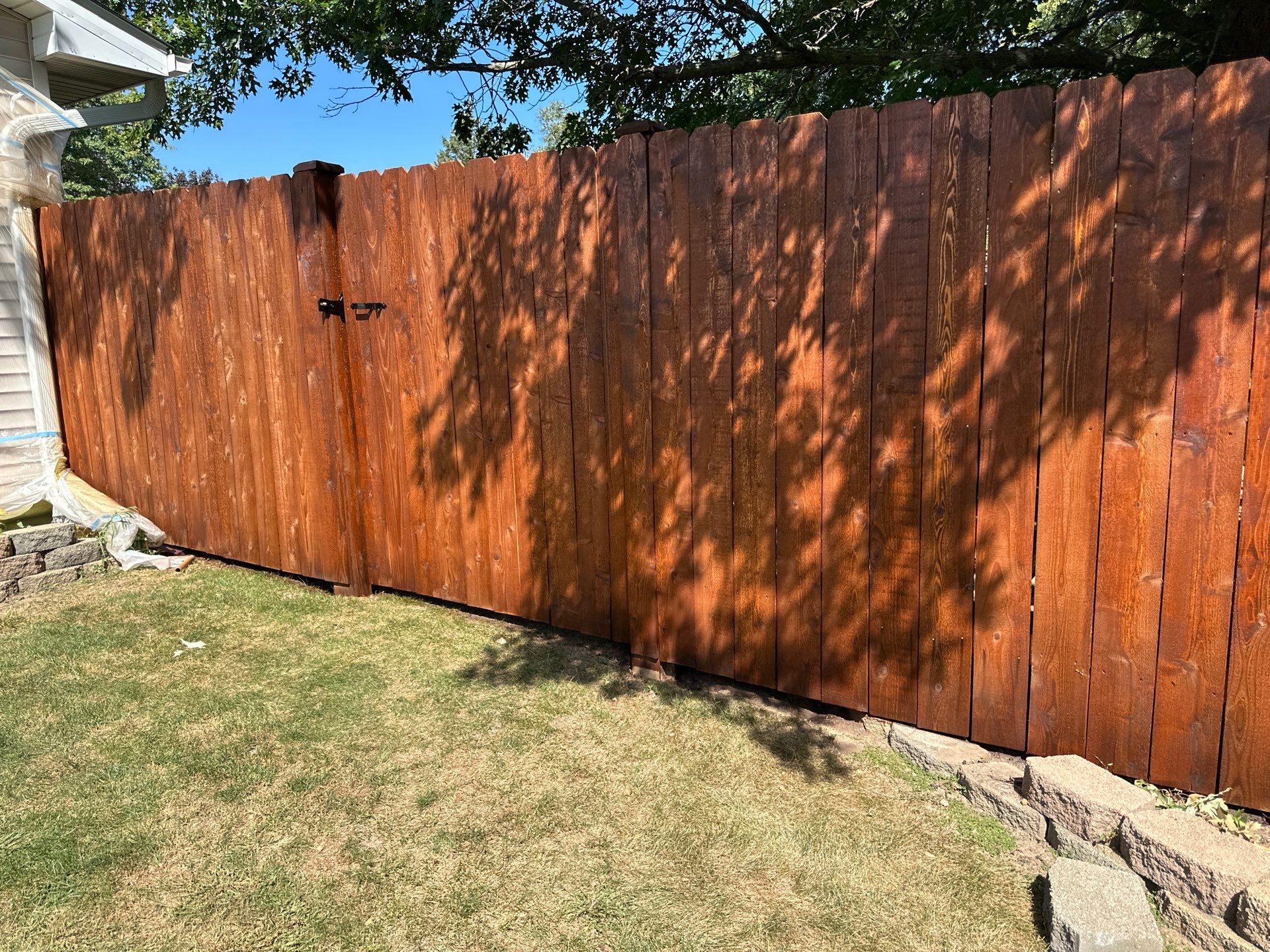 Fence Treatment by Two Brothers Residential Maintenance