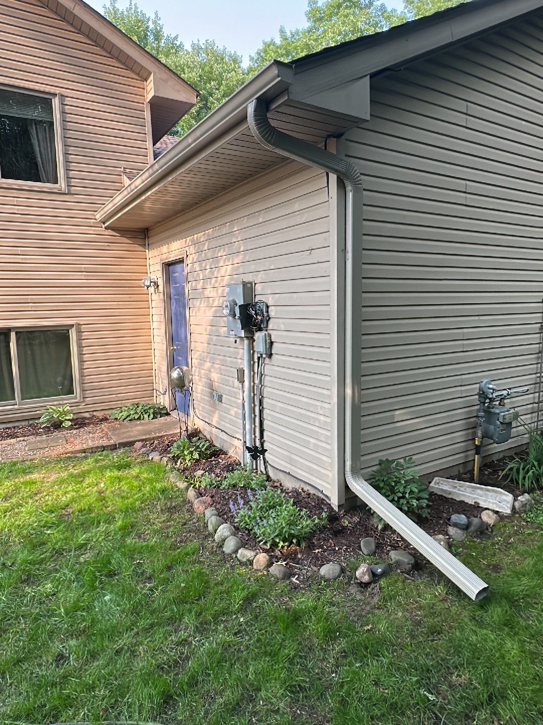 5" Gutters in Stacy by Next Level Seamless Gutters / Exteriors Inc.