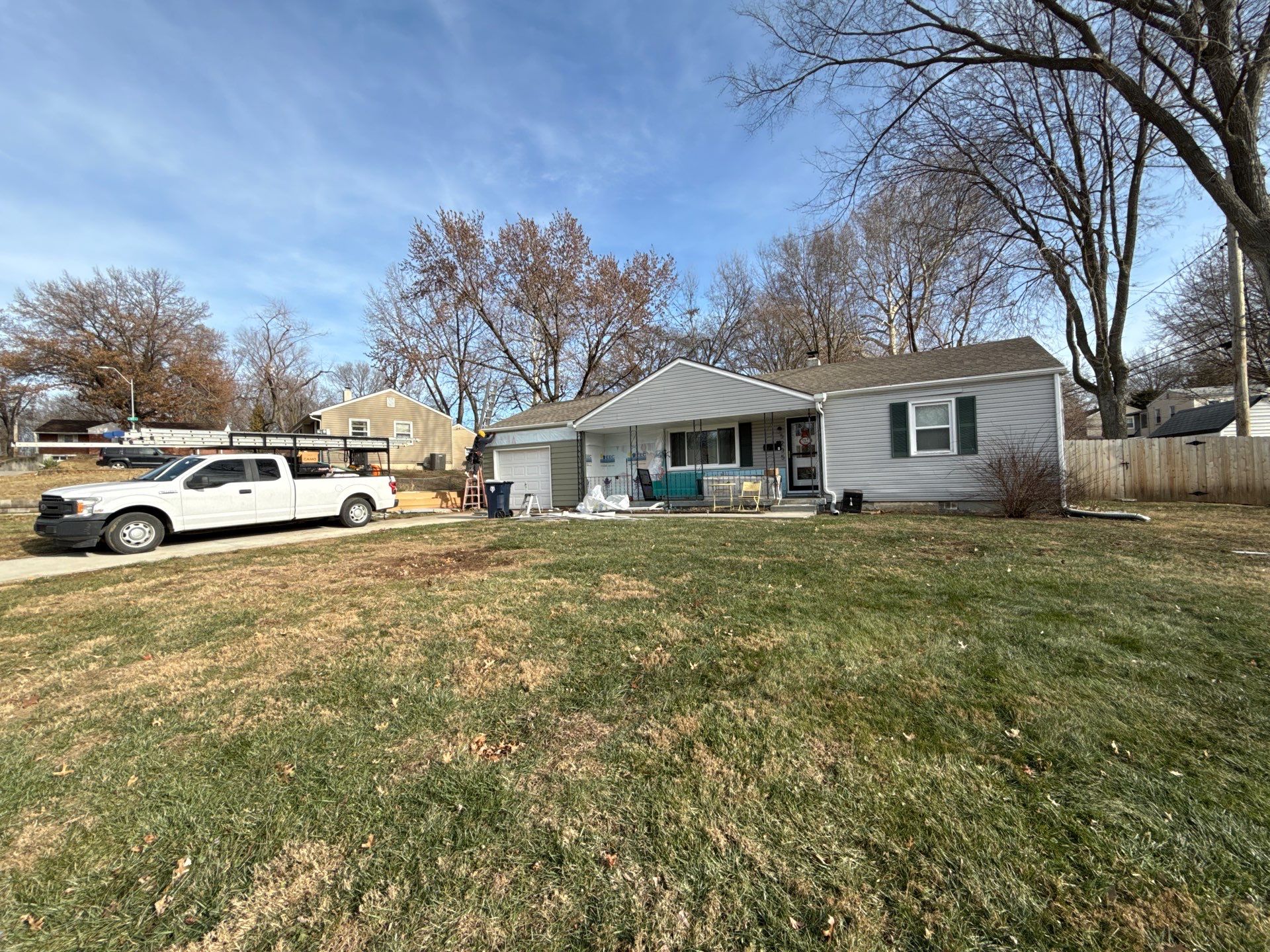 A whole new look for this Gladstone Home  by EEC  Windows, Siding & Roofing 