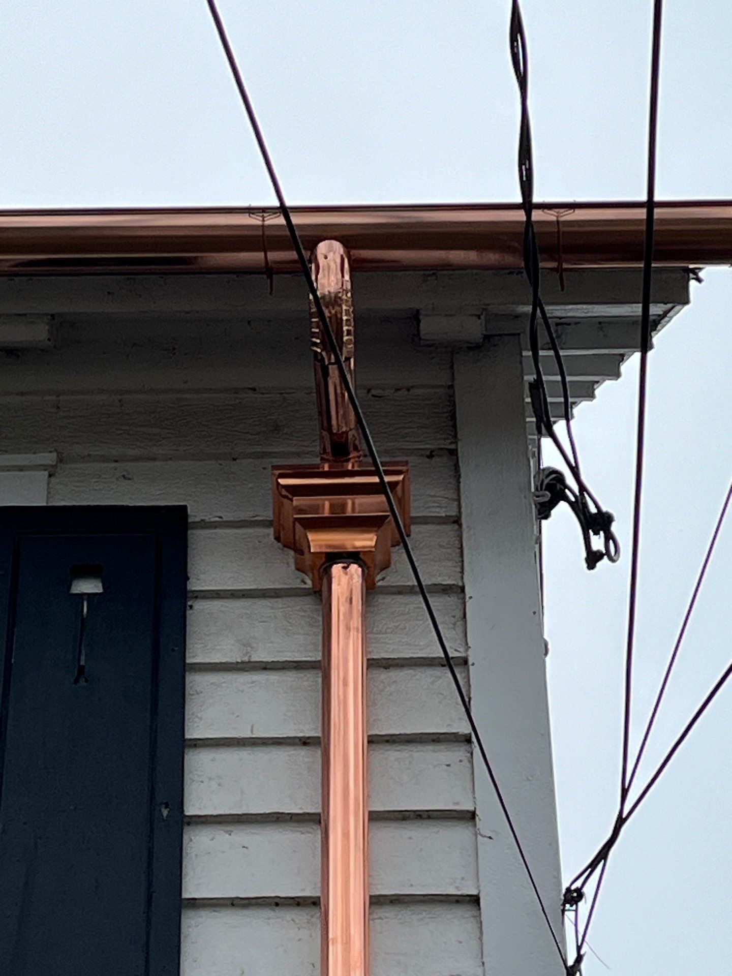 Asphalt Roof Replacement with Half Round Copper Gutter Installment by Custom Installations