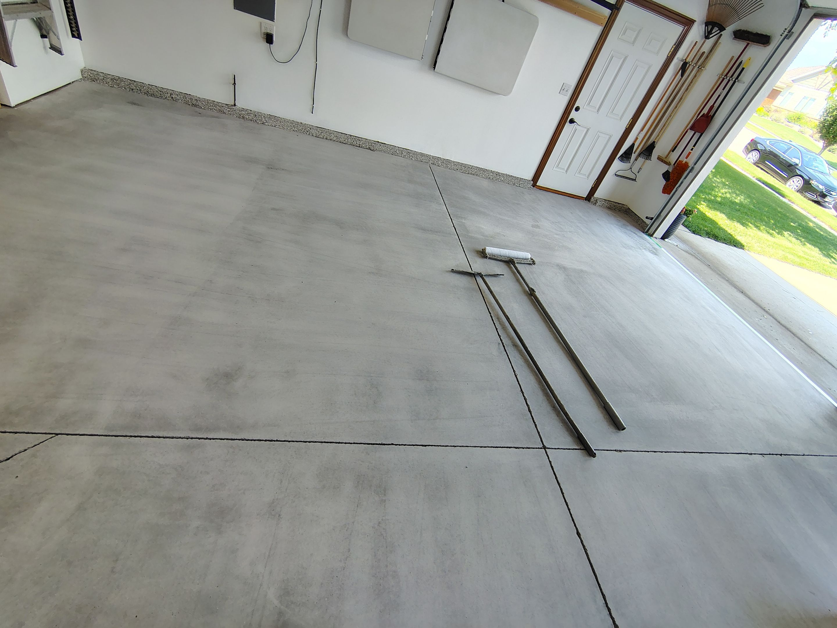 Coyote Garage Floor Coating in Sioux Falls by Select Painting, Coatings & Garage Cabinets