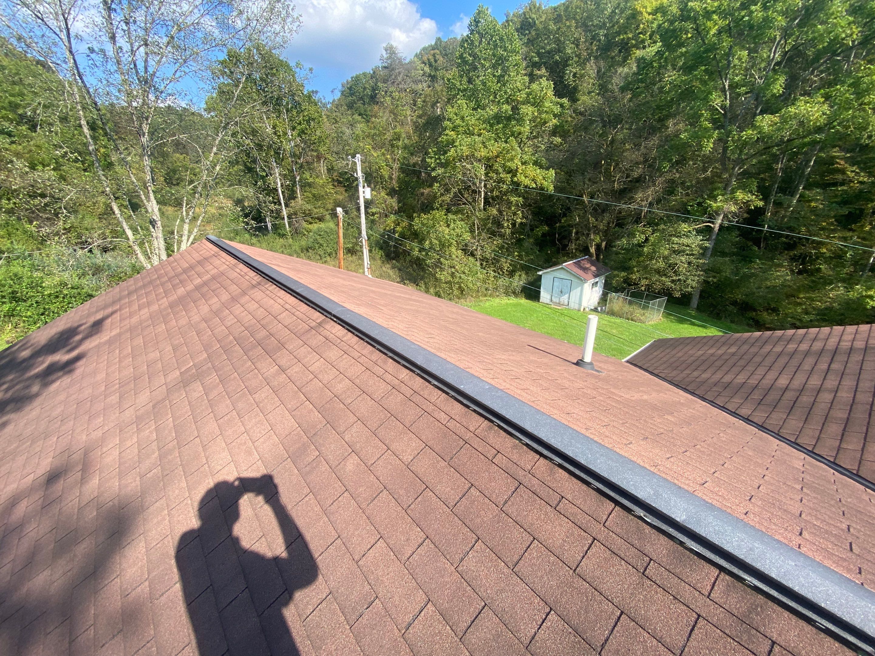 Metal Roof and Vinyl Siding, Soffit, Gutters using LifeTite Premium metal roofing  by Secure Construction Company Inc