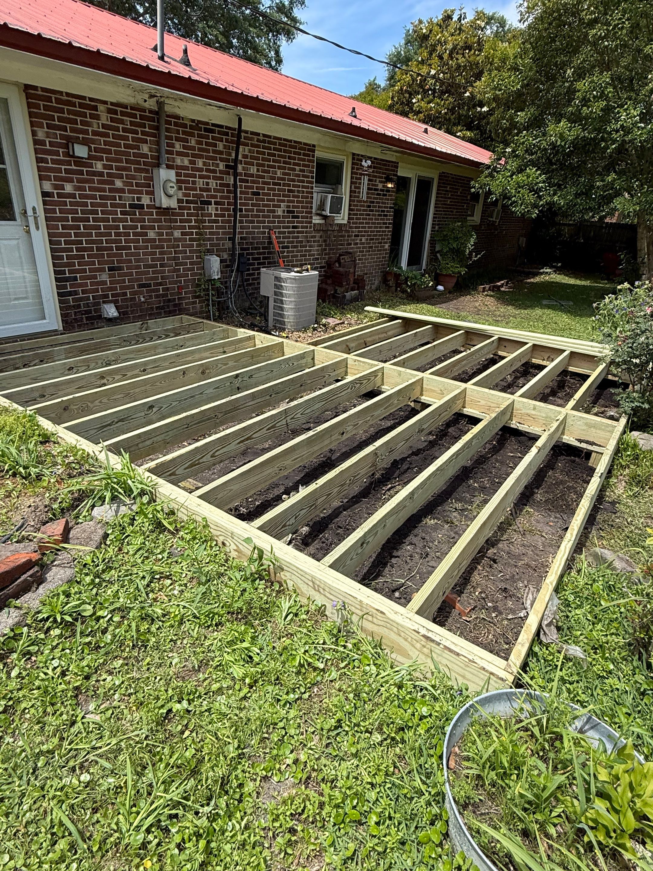 Custom Pressure-Treated Wood Deck Installation in New Bern by The Remodeling Company