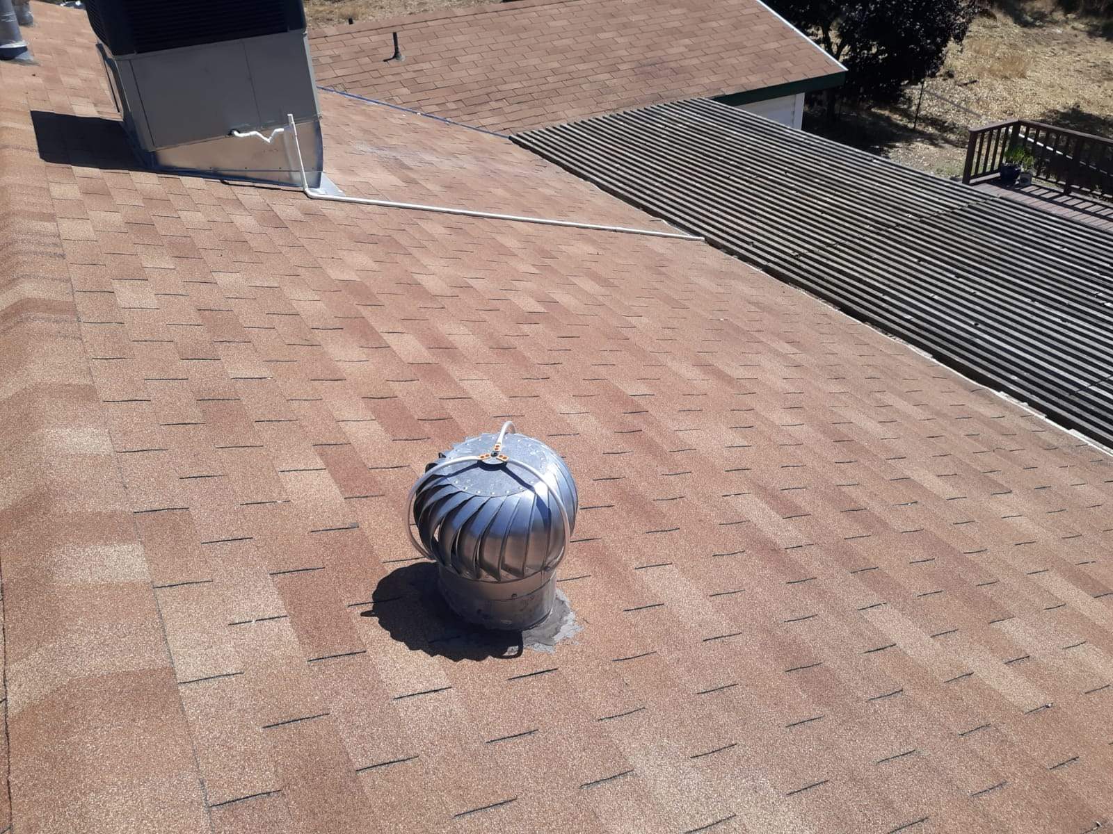 Metal roofing installation using Standing seam metal roofing system by Straight Edge Roofing Inc