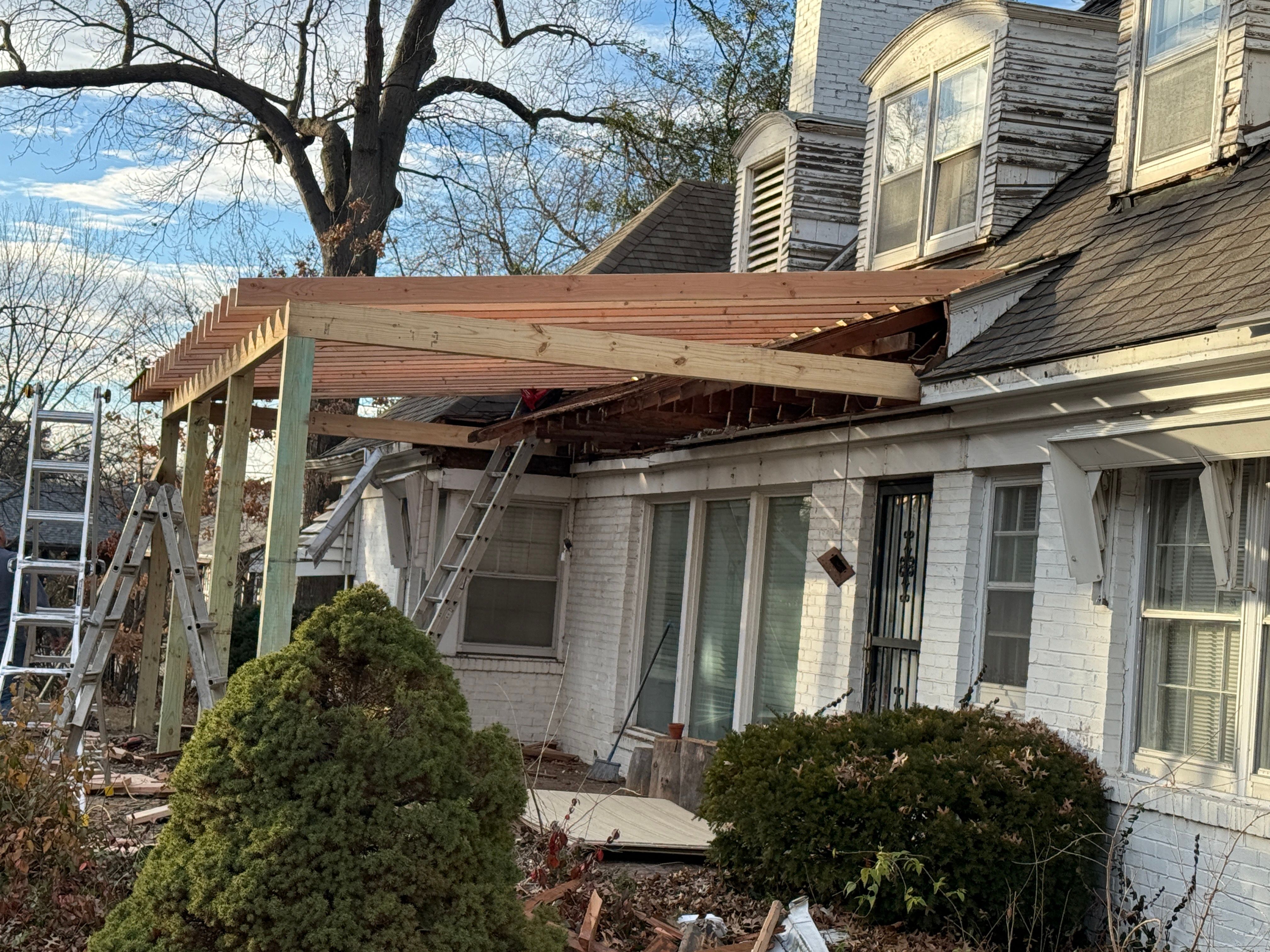 Roof Repair/Awning Rebuild from Tree Damage by Summit Roofing