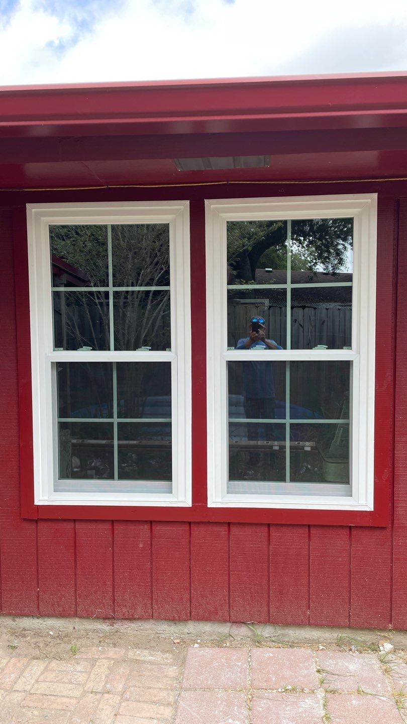 Black and white and red all over by Bayfront Roofing and Construction