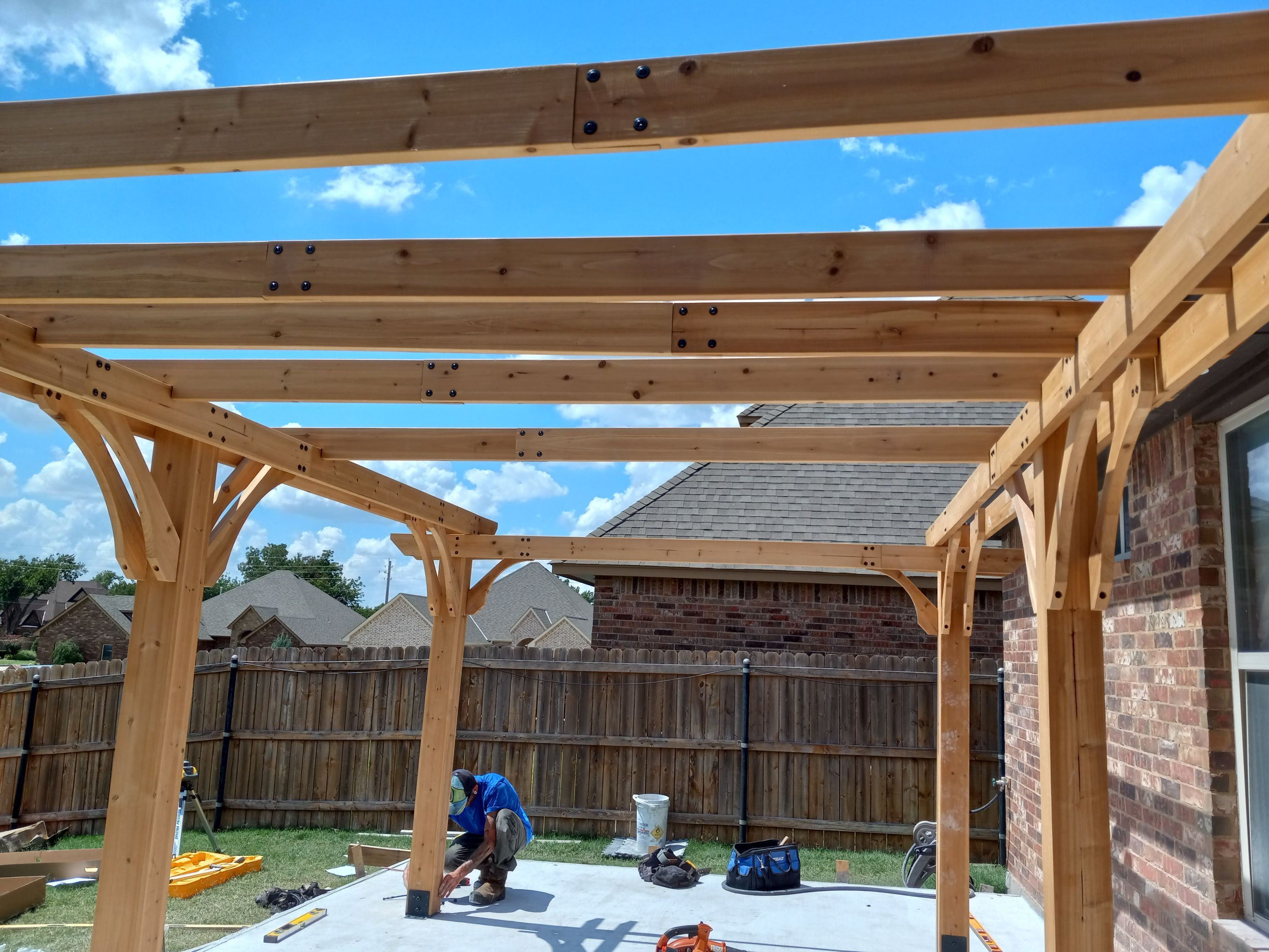 Concrete slab with Pergola by Clays Services Inc