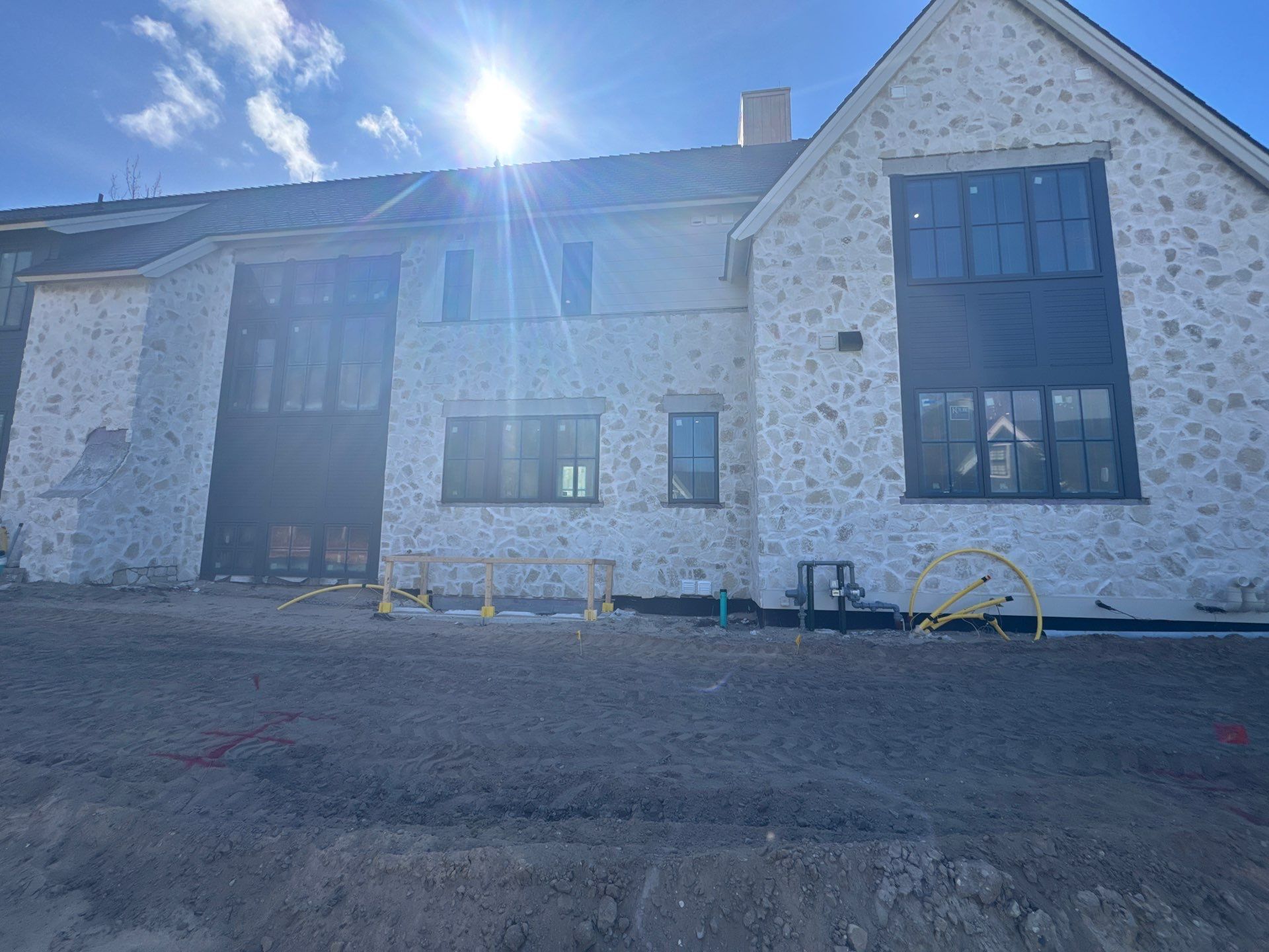 Half Round Gutter Installation for Petoskey Residence by Rainbow Seamless Systems