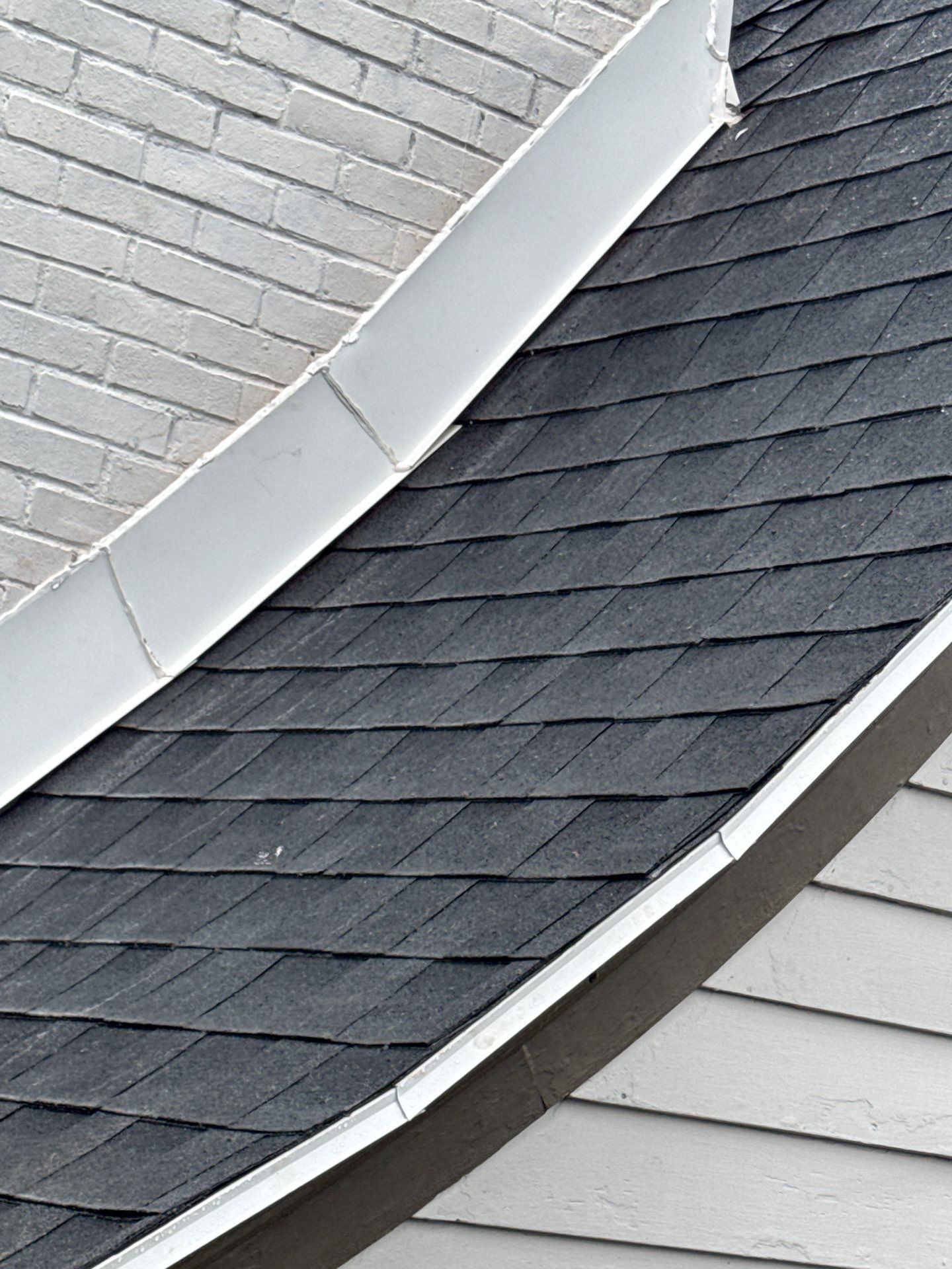 Residential Roofing Installation using GAF Timberline HDZ Charcoal by Rainstoppers Roofing