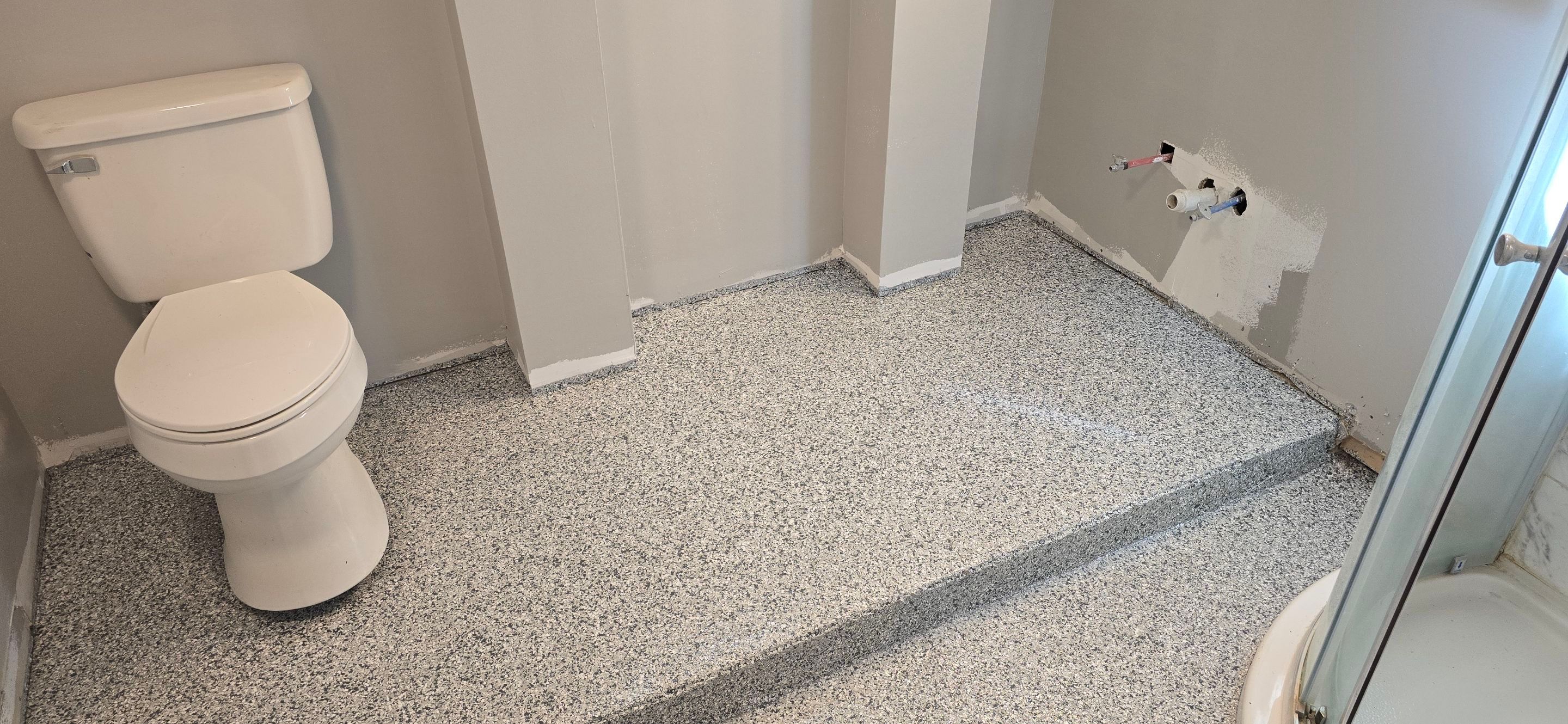 Basement using Gravel by Elite Floor Solutions