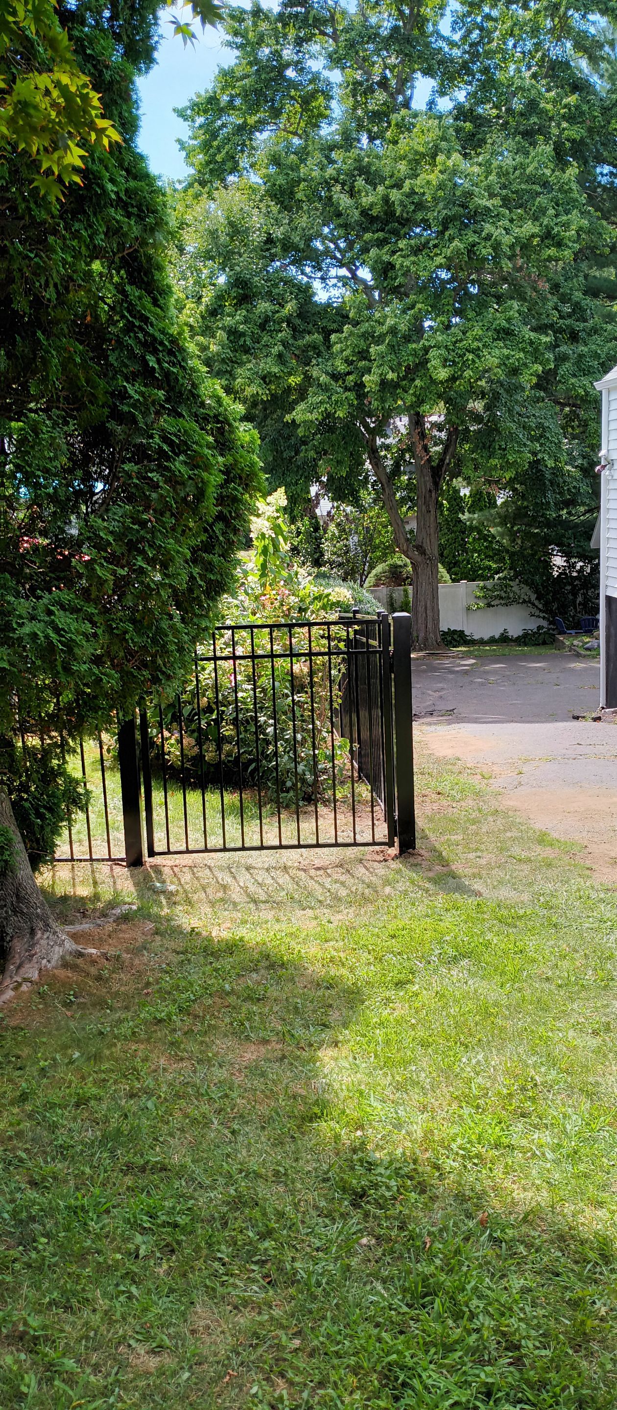 Black Aluminum Fence with matching Gate by DiGiorgi Roofing and Siding Inc