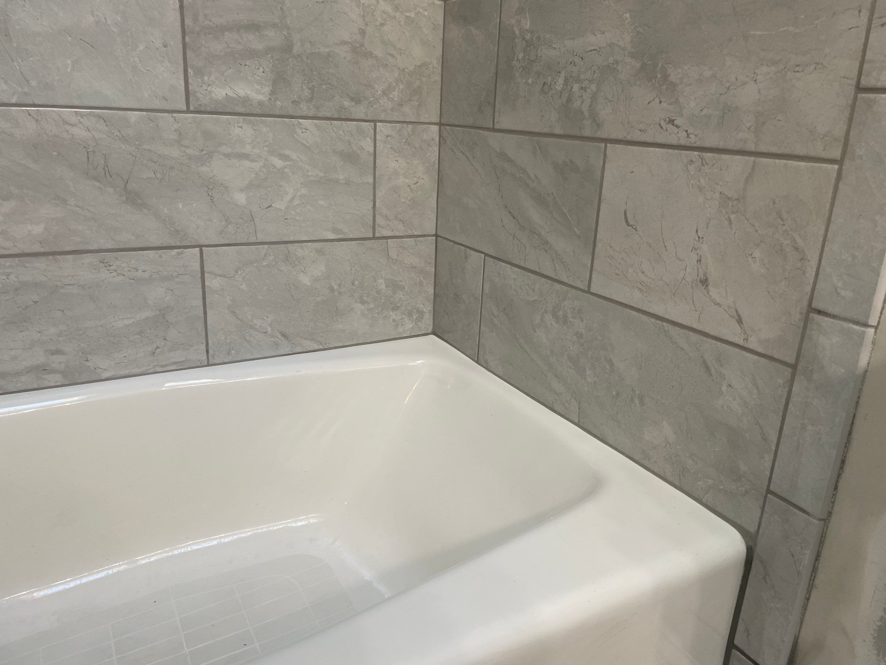 Bathroom Remodel using Tile by Home Concepts Construction
