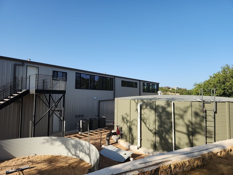 Commercial structure utilizing rainwater harvesting for all its water needs! by Hill Country Rain Water