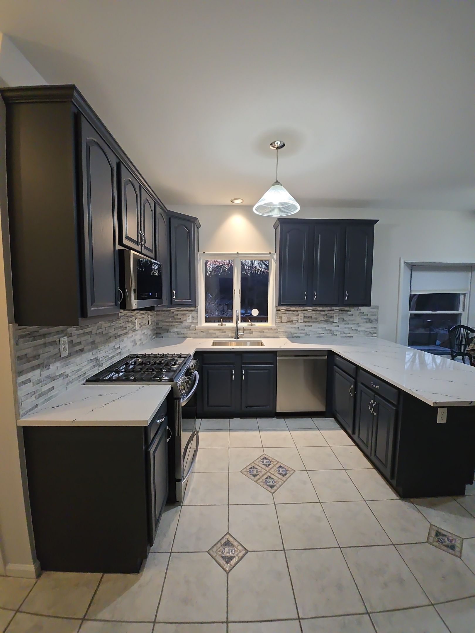Cabinet Refinishing using Benjamin Moore Command by Spectrum Painting, LLC