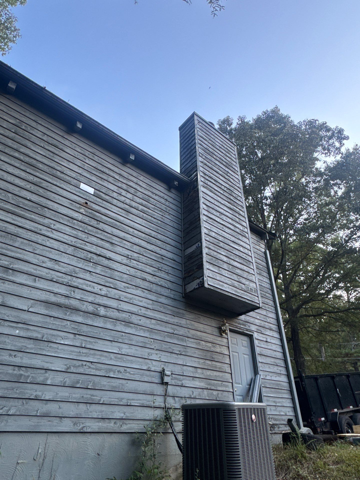 Chimney Chase Siding Replacement and Exterior Painting in Cartersville by Swift Home Renovations 