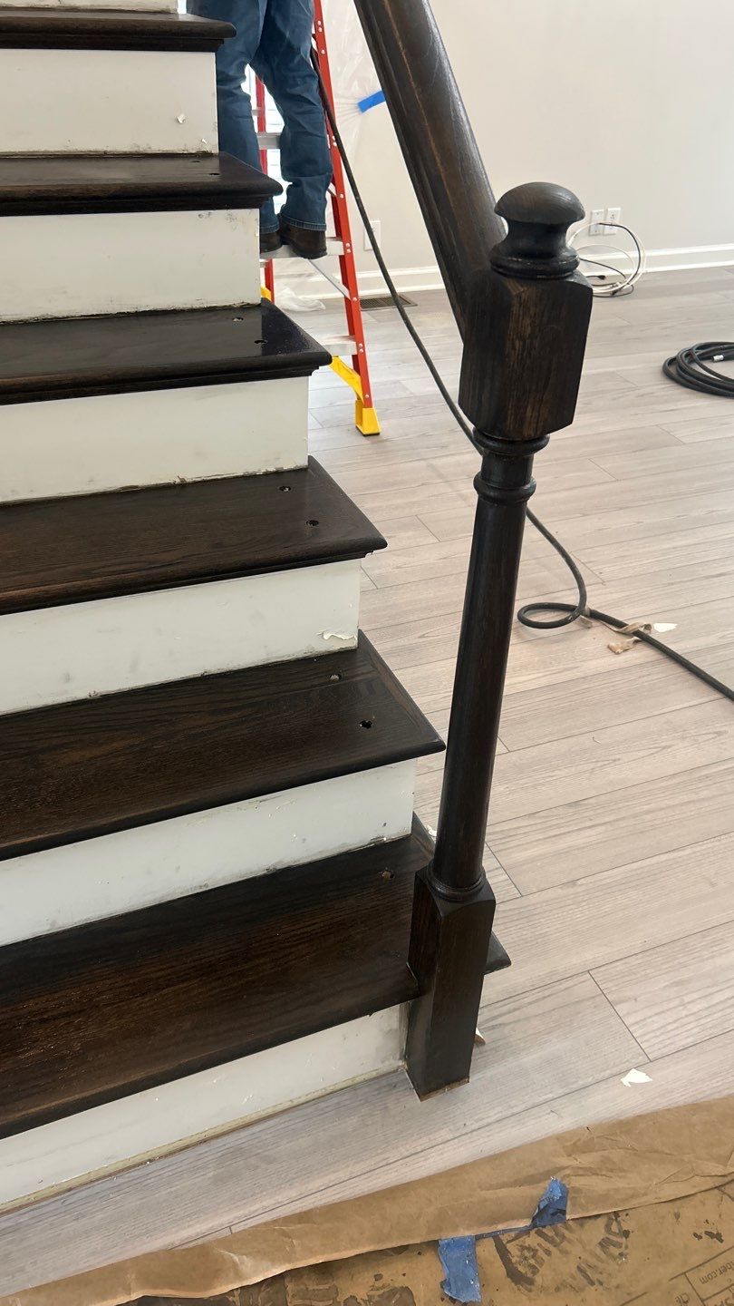 Updated staircase and hallway by Footprints Floors of Nashville