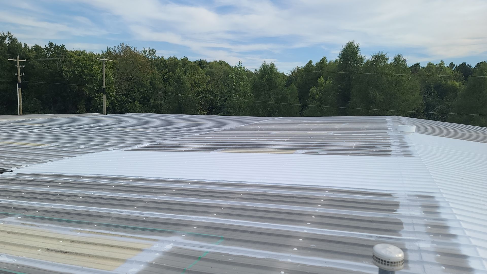 Commercial Metal Restoration System using Aldocoat Coatings by Hostetler Roofing