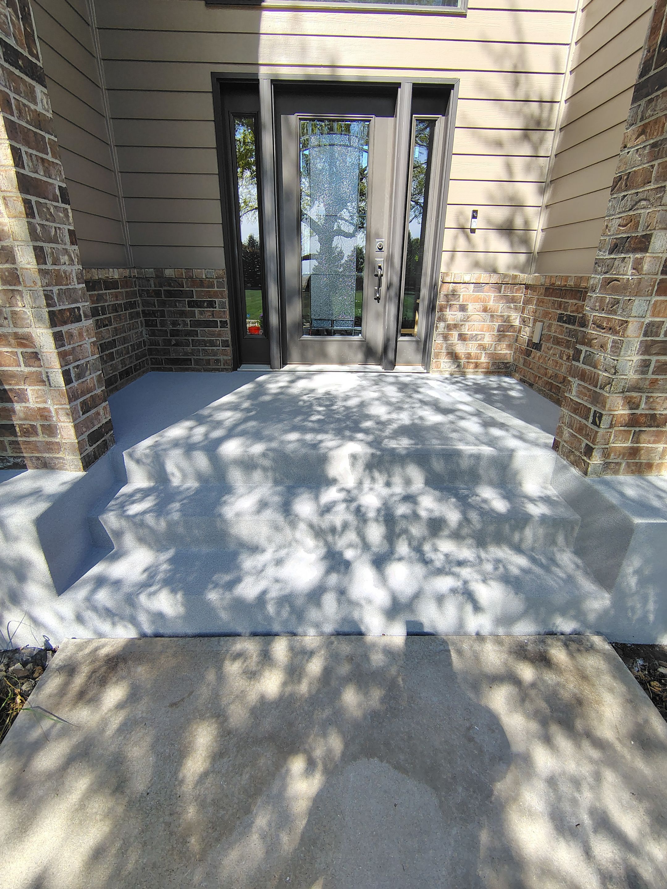 Front Porch Concrete Coating and Restoration in Harrisburg by Select Painting, Coatings & Garage Cabinets
