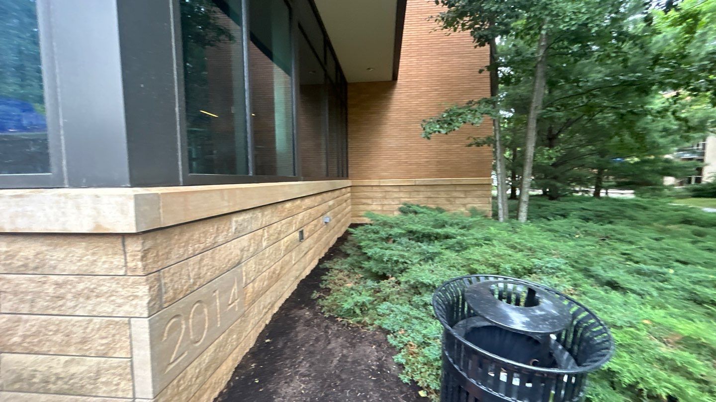 natural stone using Algaecide, soft wash soap by Northern Power Washing LLC.