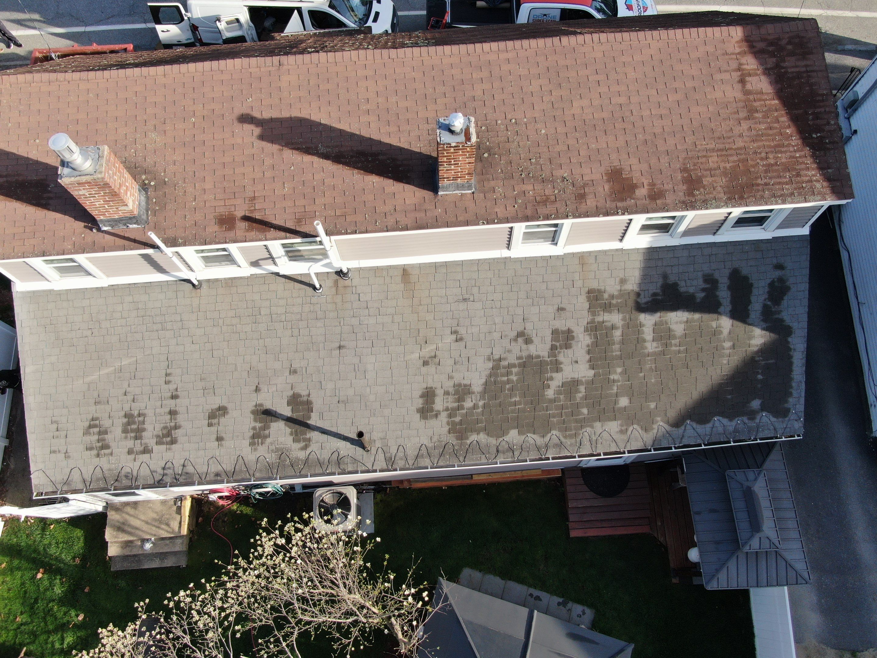 Roof Replacement with Owens Corning TruDefinition Shingles in Midnight Plum by Mighty Dog Roofing of Greater Middlesex County