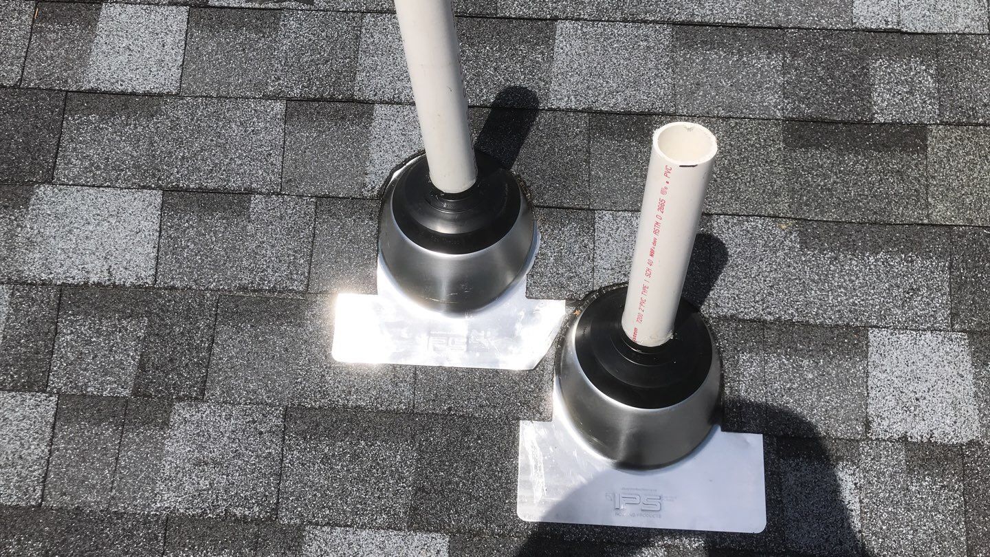 Commercial Roofing Installation using EPDM with white gutters by A Plus Exterior