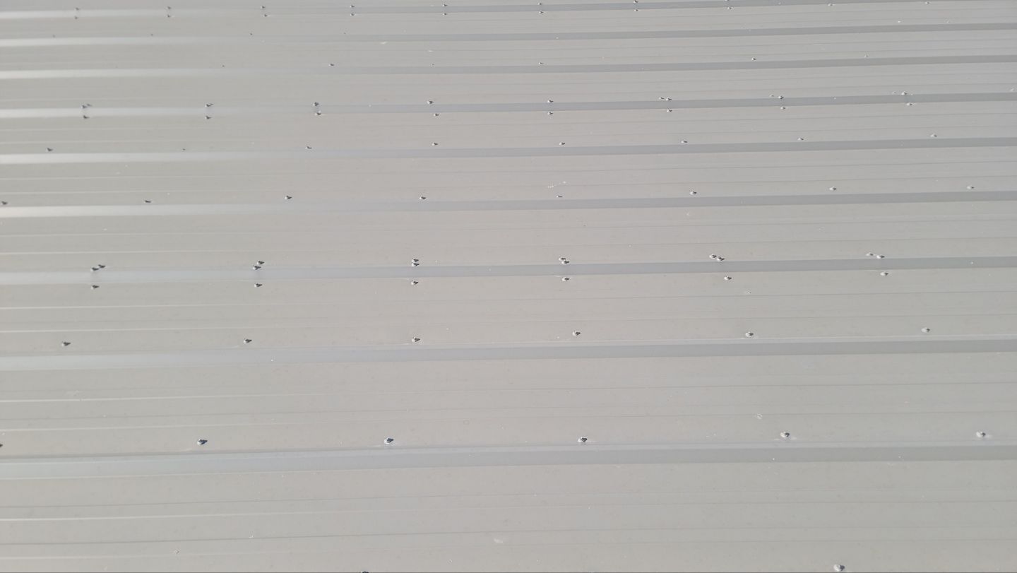 Commercial Roof Replacement – PBR Metal Panels After Hail Damage by ASAP Roofing & Exteriors