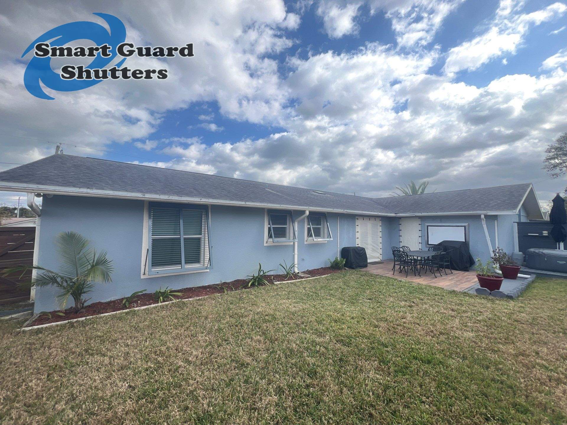 Hurricane Protection in Blue Grey by Smart Guard Shutters