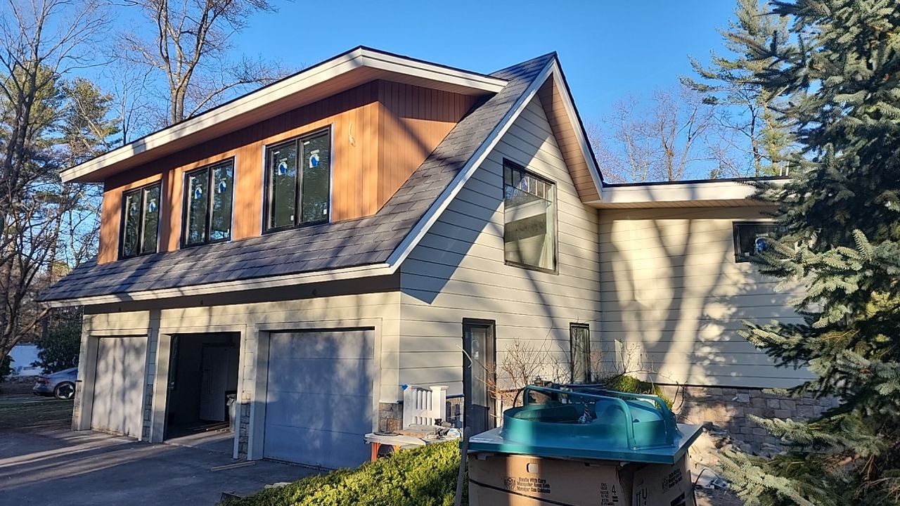Siding in Weston,  MA by UBrothers Construction
