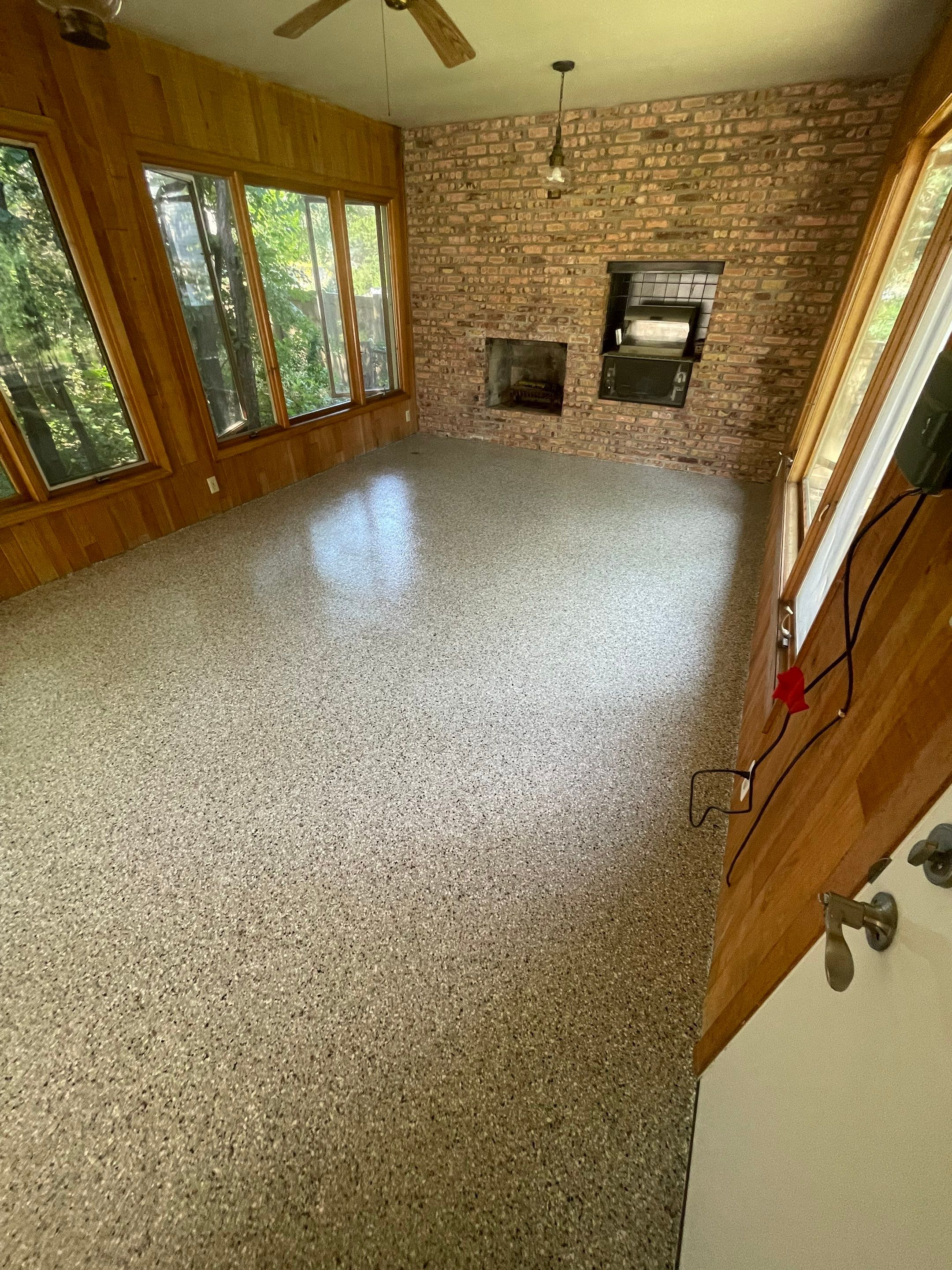 Sioux Falls Garage and Sunroom Concrete Coating with Coyote Flake by Select Painting, Coatings & Garage Cabinets