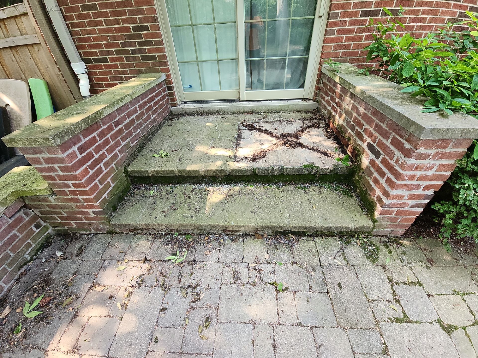 Brick paver repair, clean, seal and poly sanding by Northern Power Washing LLC.