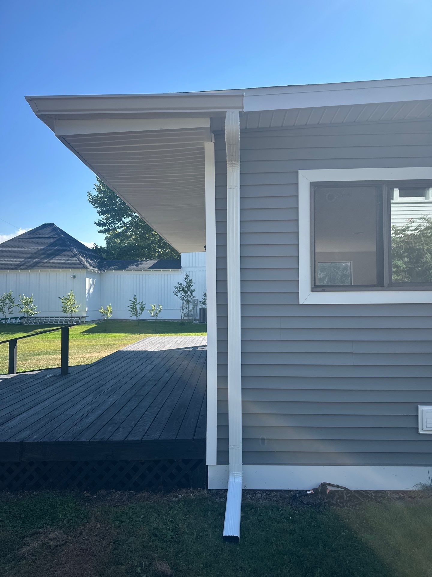 Complete Gutter and Downspout Installation in Charlevoix by Rainbow Seamless Systems