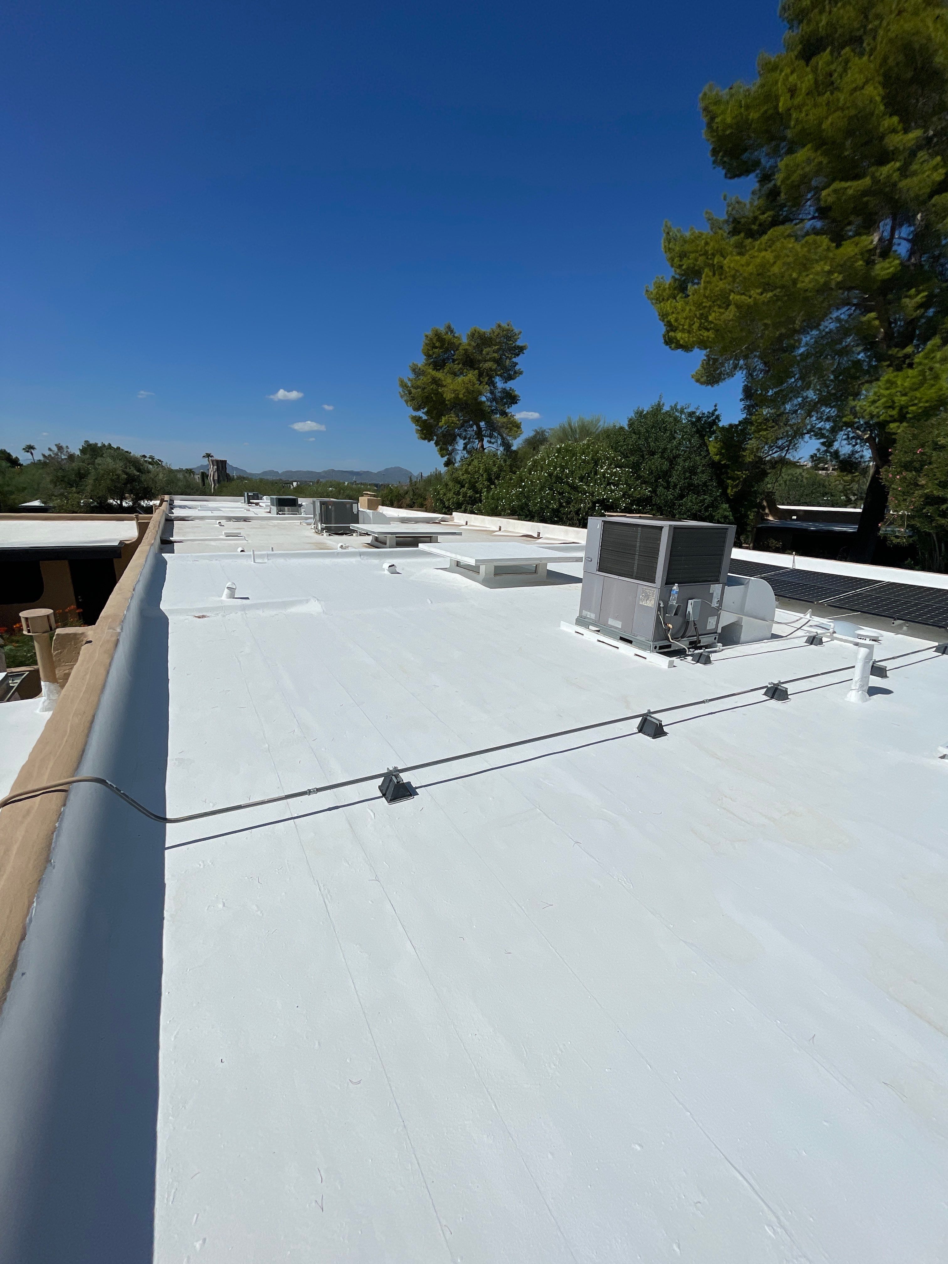 Tucson Residential Low Slope Roof Restoration and Solar Installation by West Coast Roofing AZ