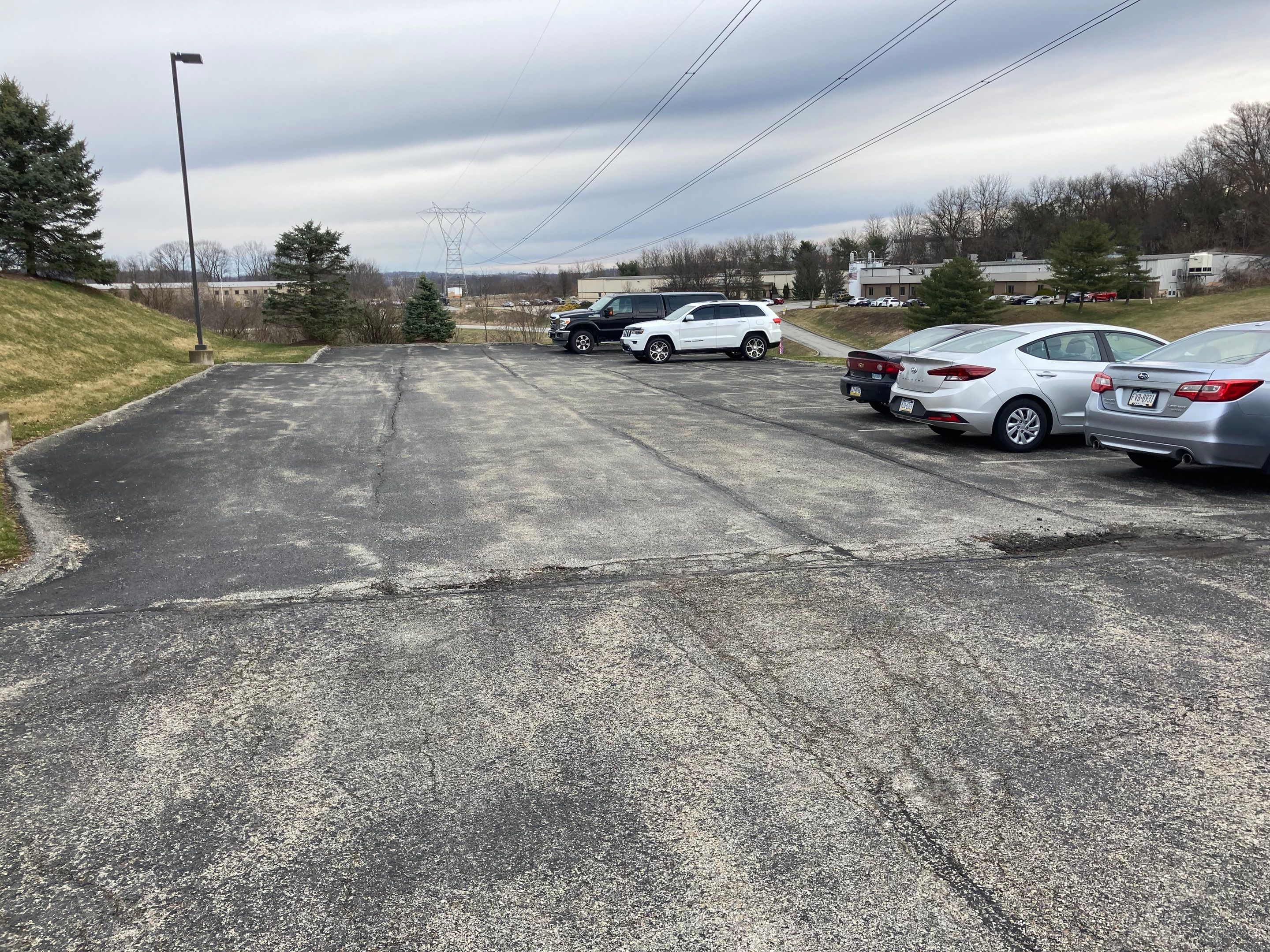 Asphalt Resurface Commercial Park Lot using asphalt by Brant's Asphalt