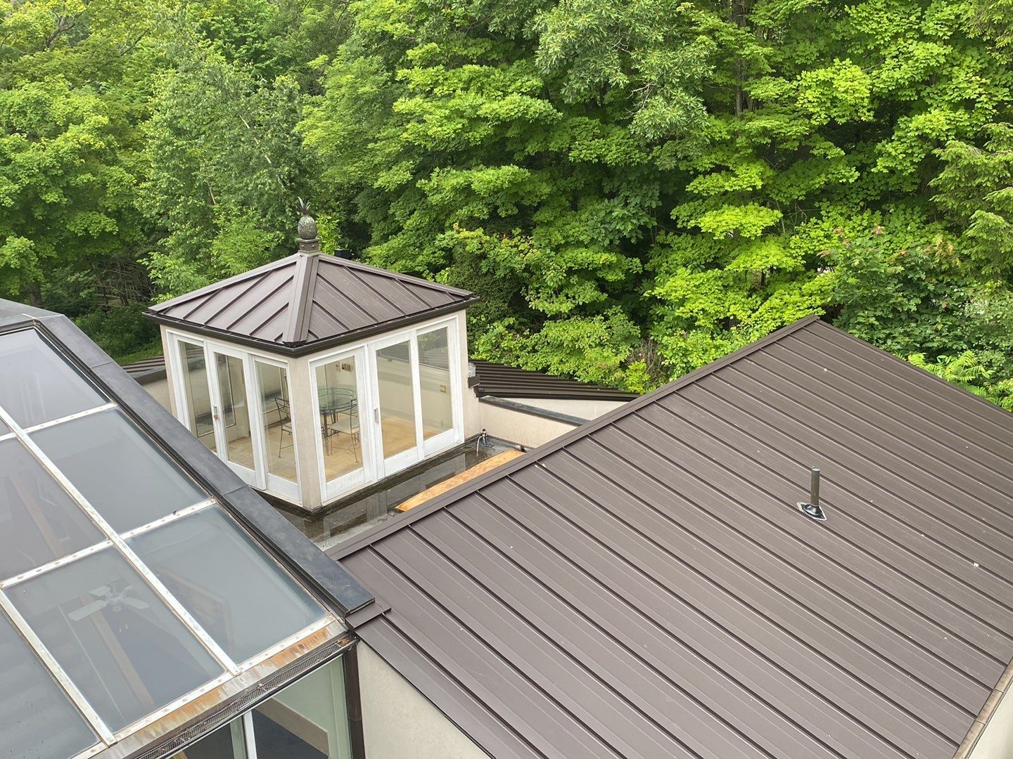 Roof Replacement using 16" Standing Seam Panels by Jay Carter Roofing & Sheet Metal