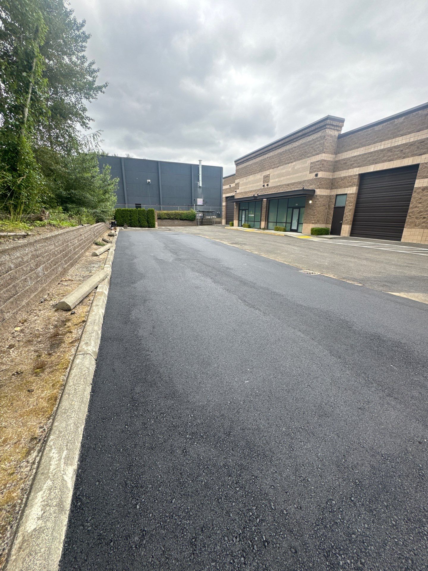 Asphalt Patch Repair & Concrete Curb Renovation | Kirkland  by Jireh Asphalt & Concrete Inc 