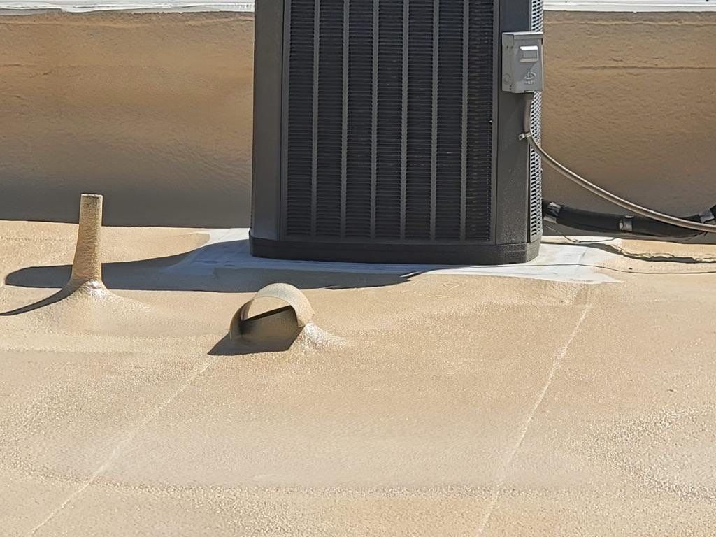 Spray foam and coatings using Conklin Benchmark/PUMA XL coatings and spray foam by Straight Edge Roofing Inc