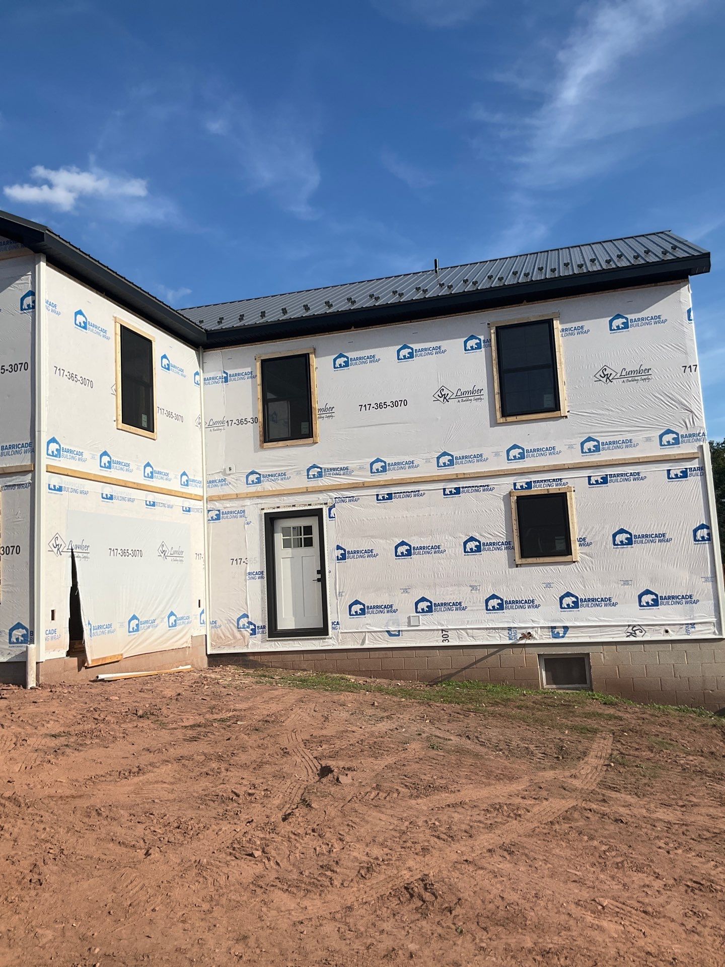 Two-Story Residential Addition and Exterior Transformation by Esh Builders