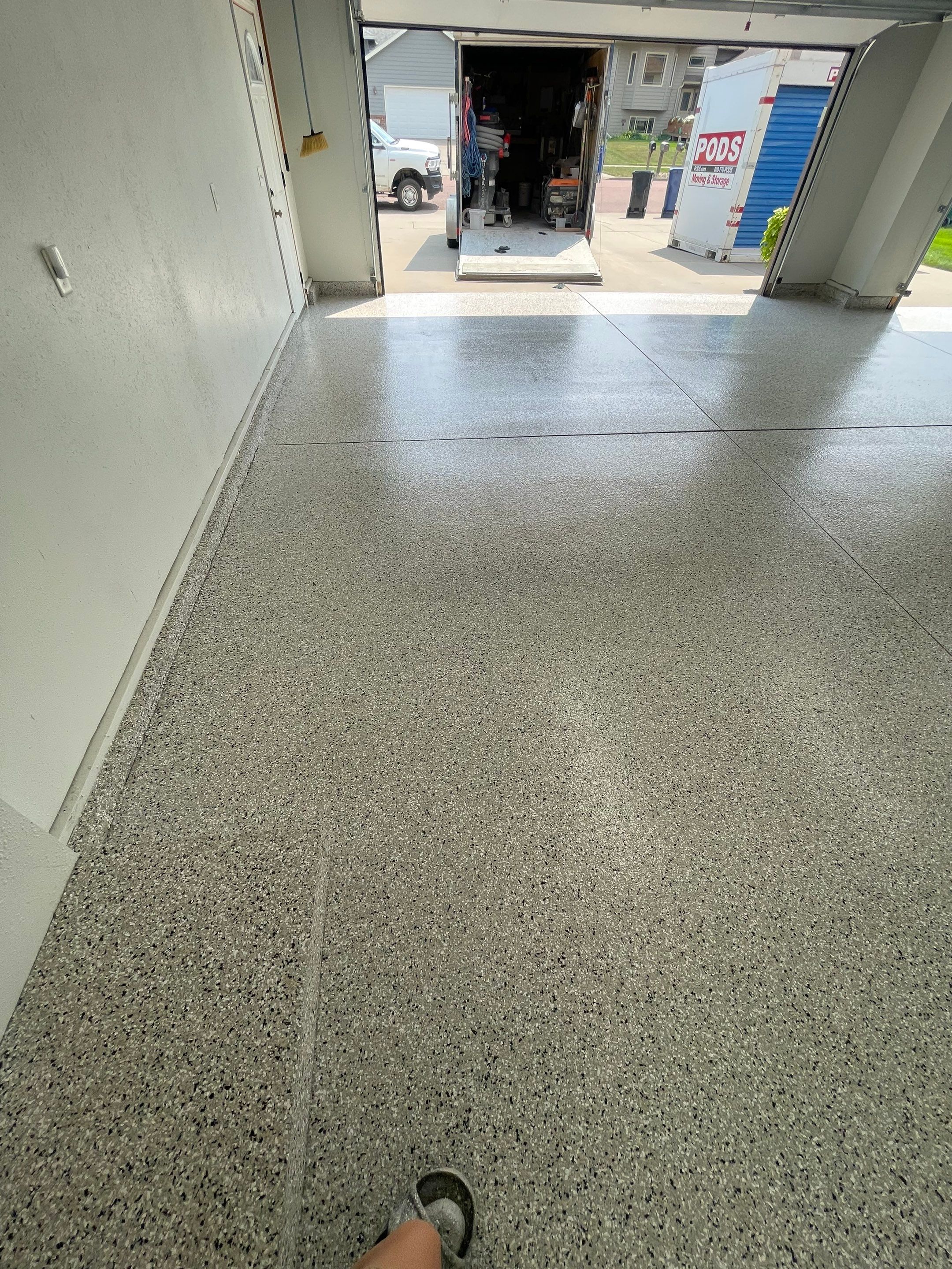 Multi-Car Garage Floor Coating and Crack Repair in Tea by Select Painting, Coatings & Garage Cabinets