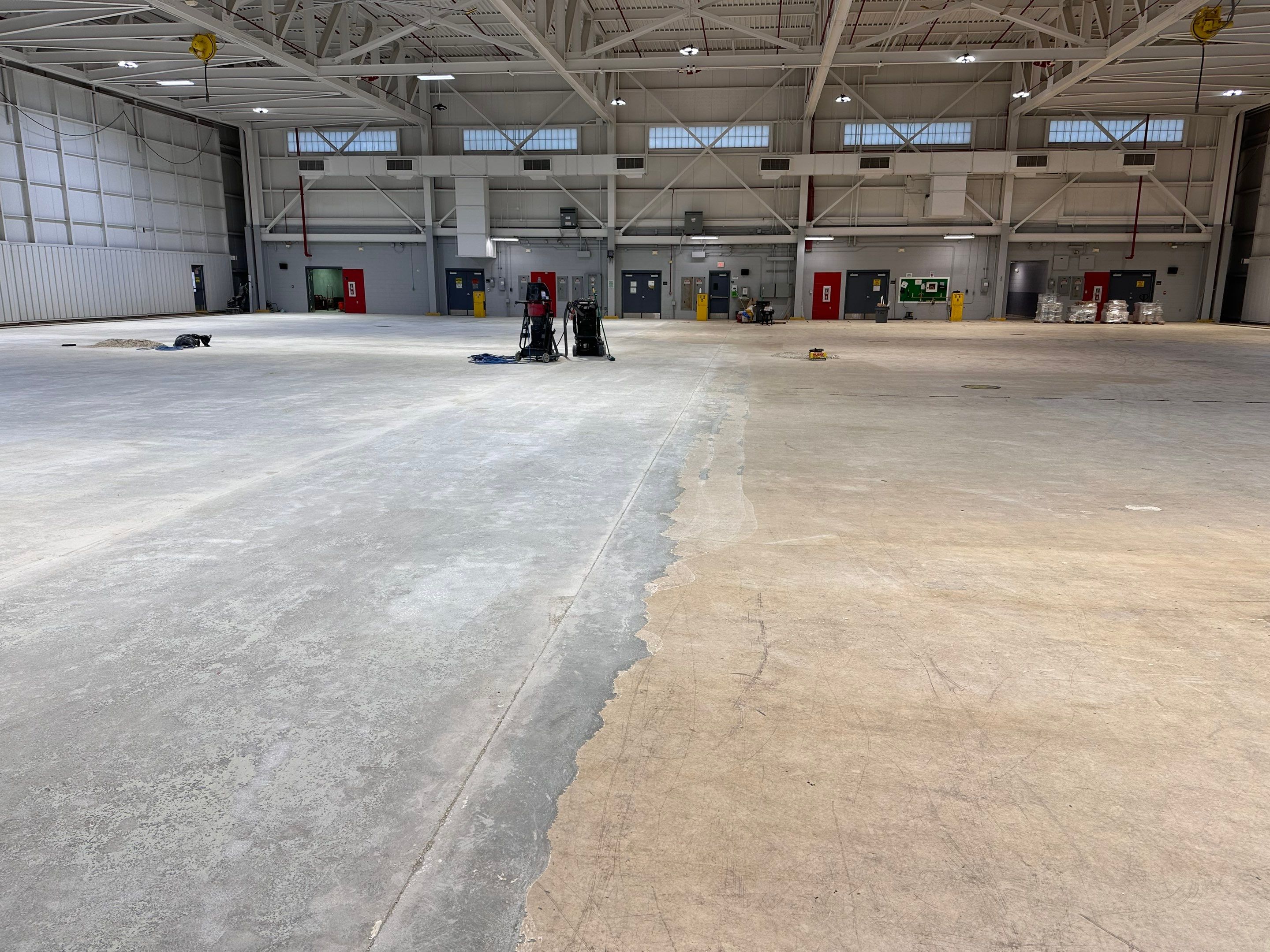 Industrial Epoxy Flooring for Army National Guard Hangar in Mobile by Cornerstone Hard Surface Restoration 