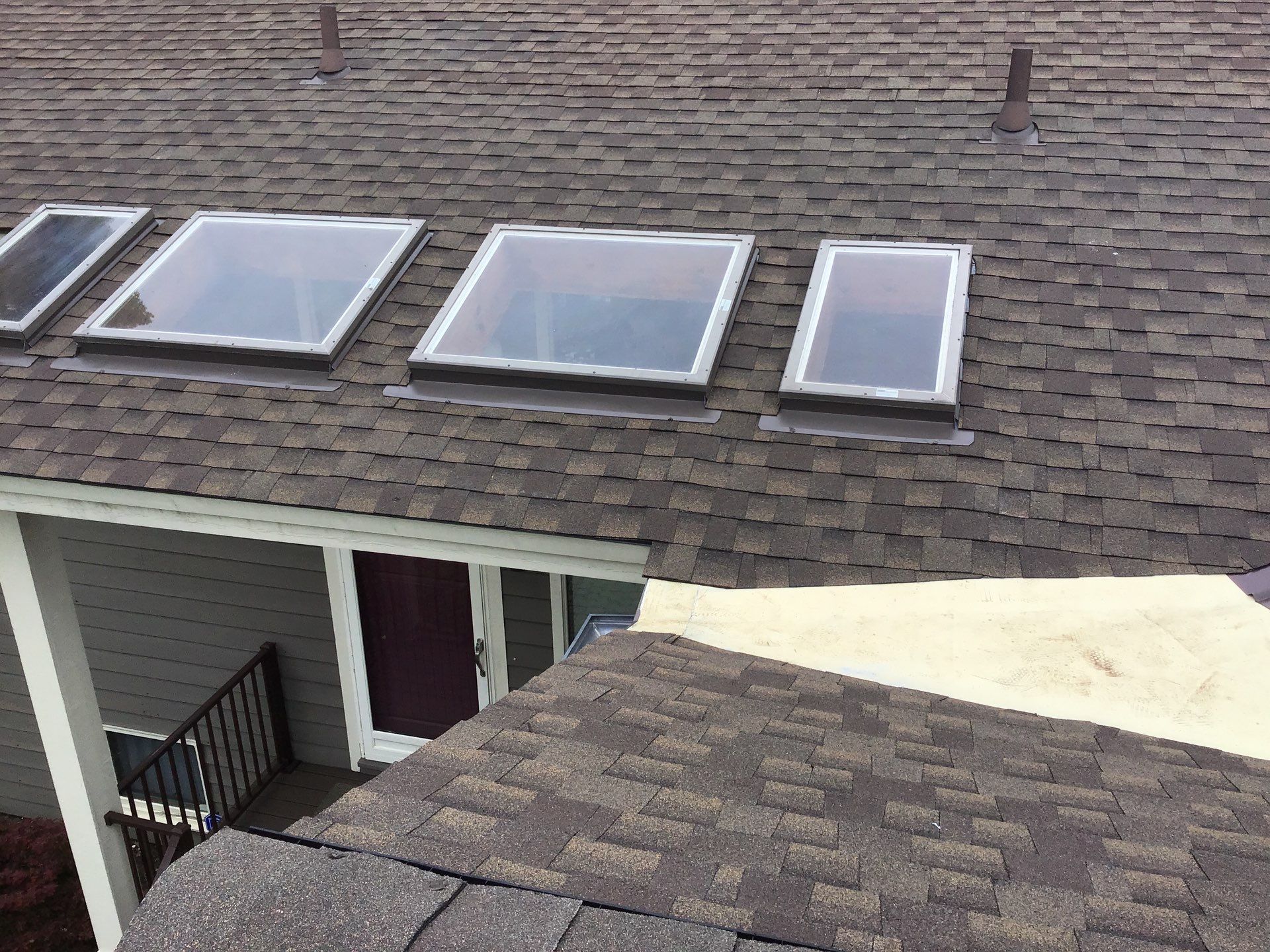Velux Skylights, GAF Roofing, Front Porch Overhang by Northwest Construction