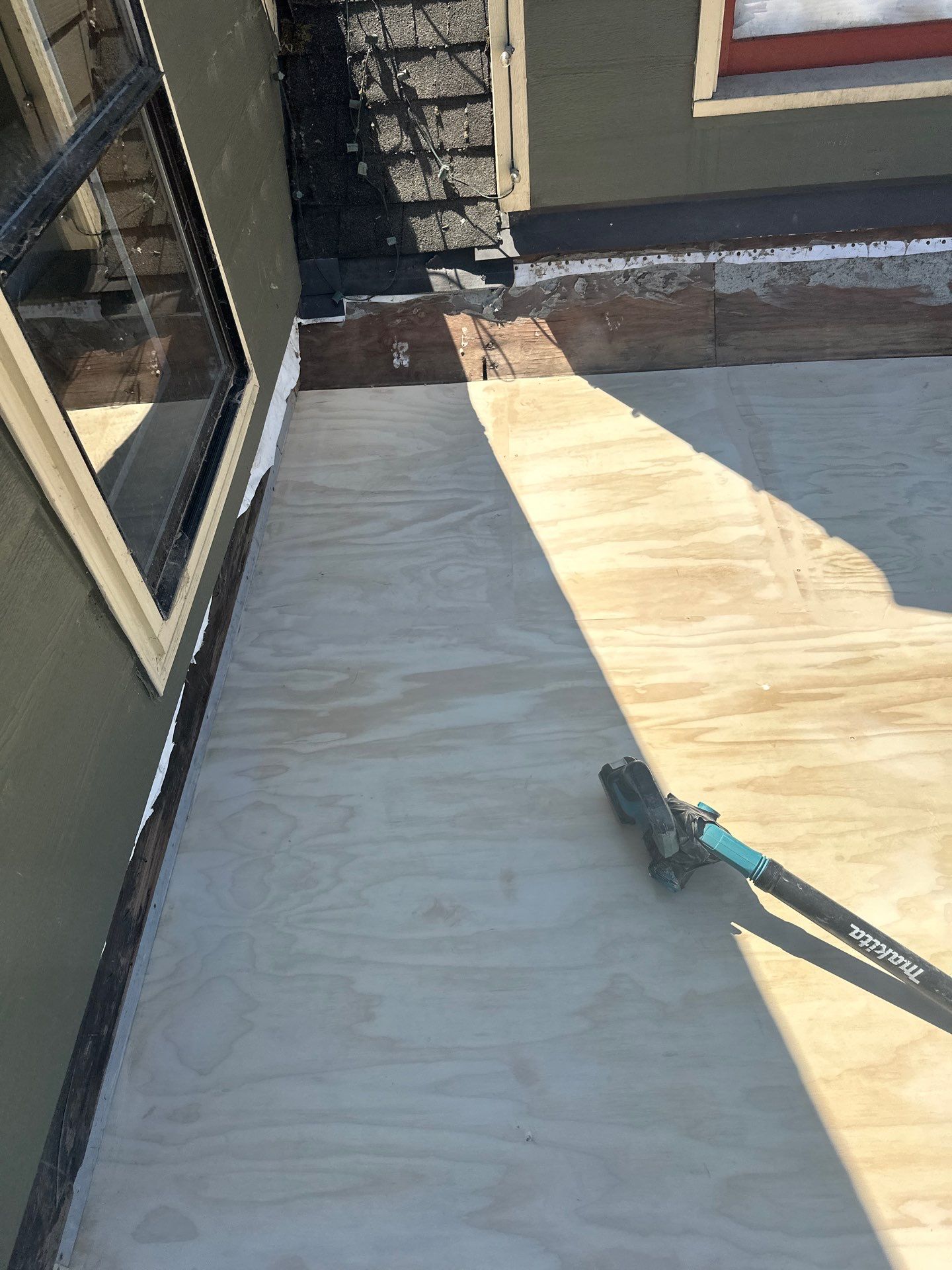 Dec-Tec Walkable Membrane using Dec-Tec (Color: Bronze) by Orezona Building & Roofing Company, Inc.