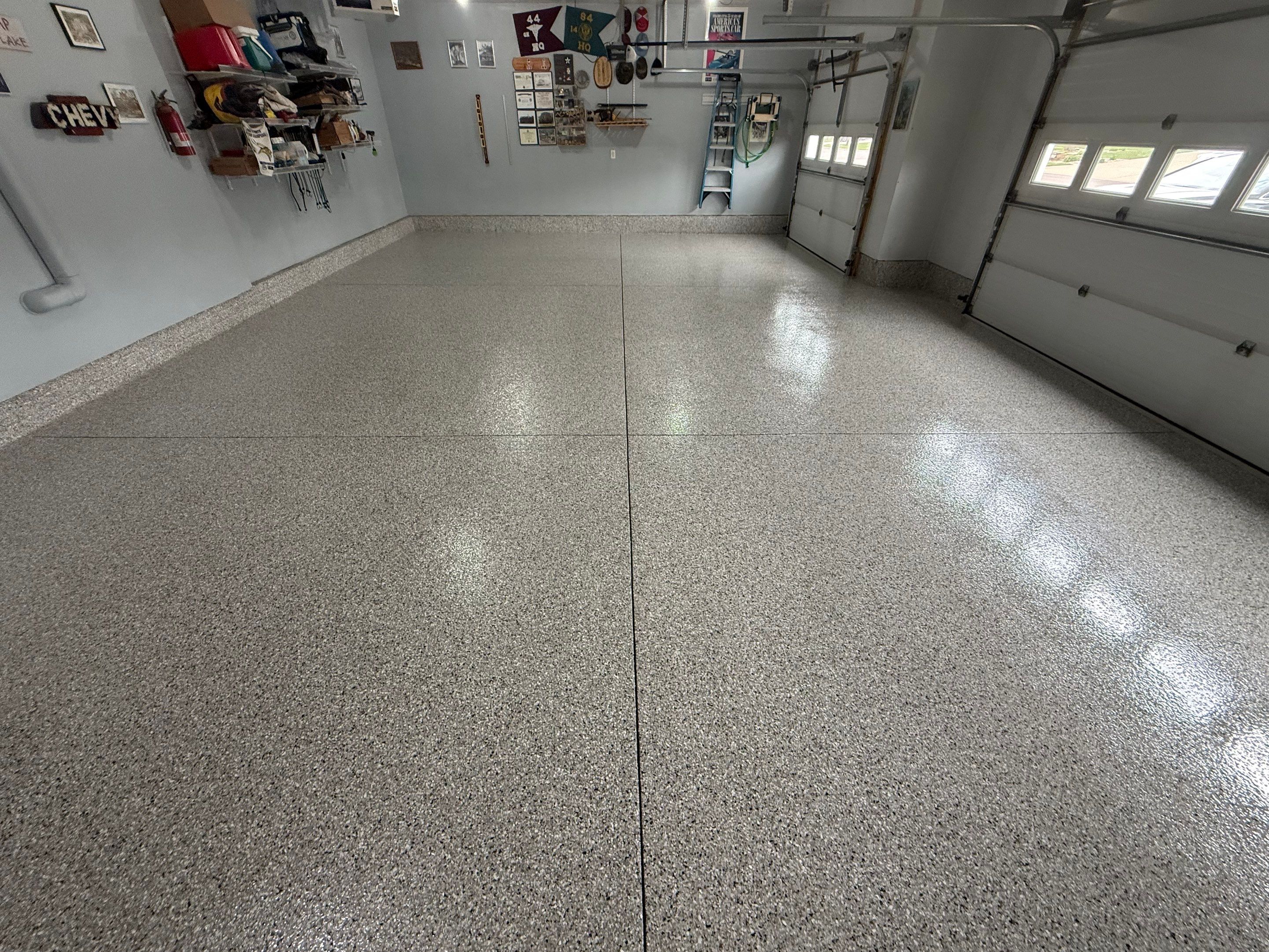 High-Gloss Epoxy Garage Floor Coating in Sioux Falls by Select Painting, Coatings & Garage Cabinets