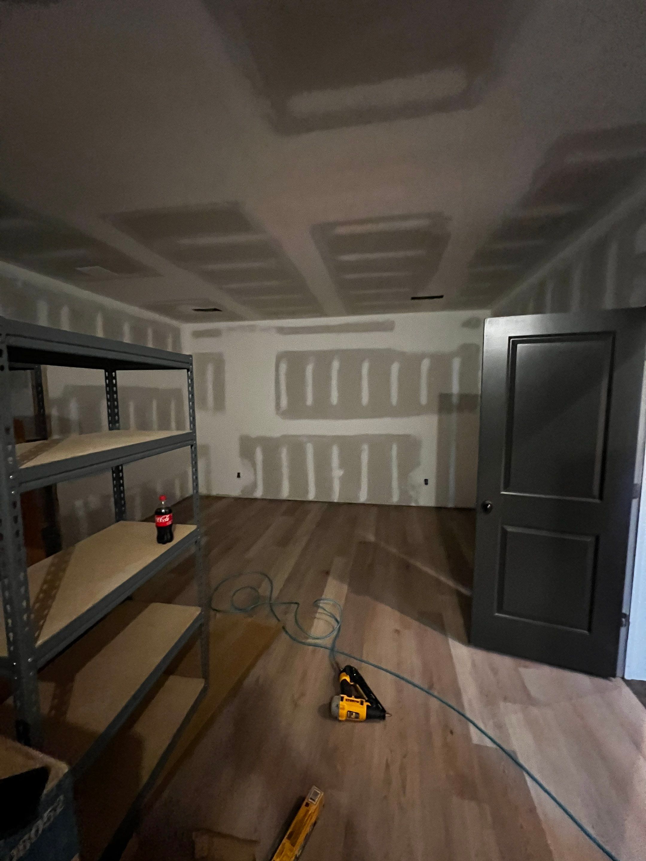 Basement Remodeling With New Bathroom and Luxury Vinyl Flooring by Swift Home Renovations