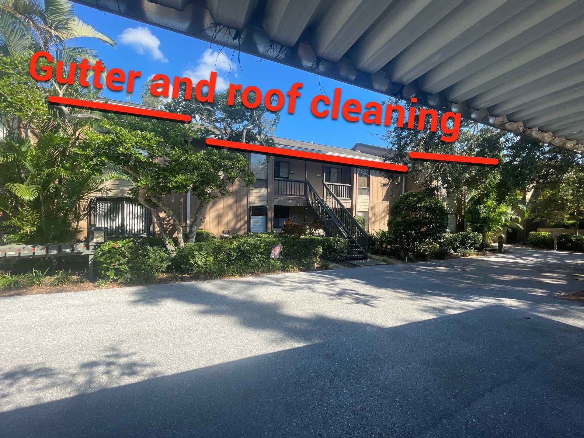 Clean Gutters and Roof in Sarasota FL by Gutter Professors