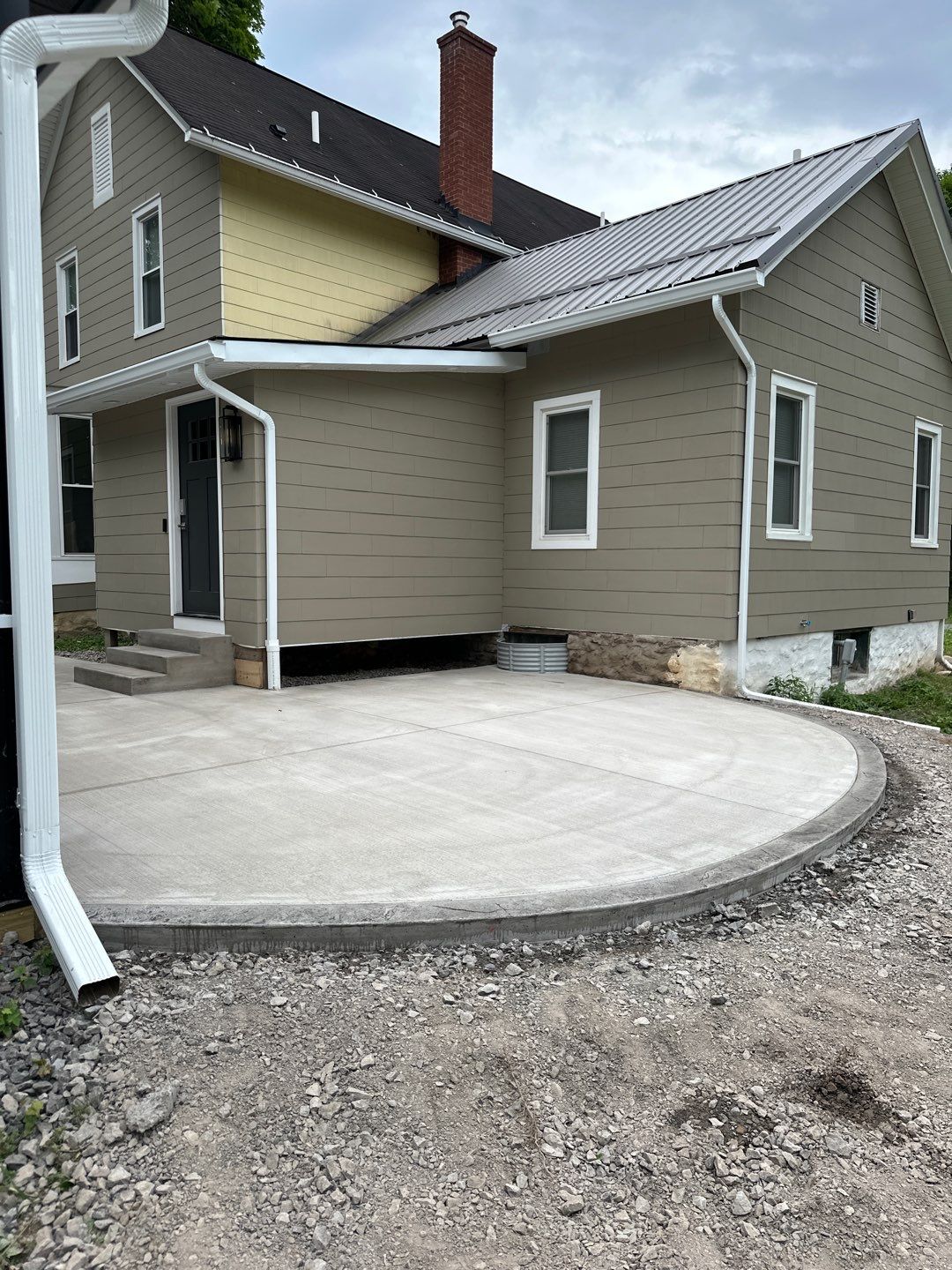 Broom finished concrete patio and sidewalk  by NG Masonry & Construction LLC