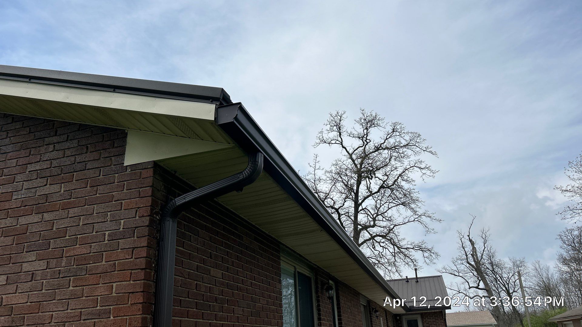 Residential Roofing Installation using Performance Panel Metal - Crinkle Bronze by RoofX 