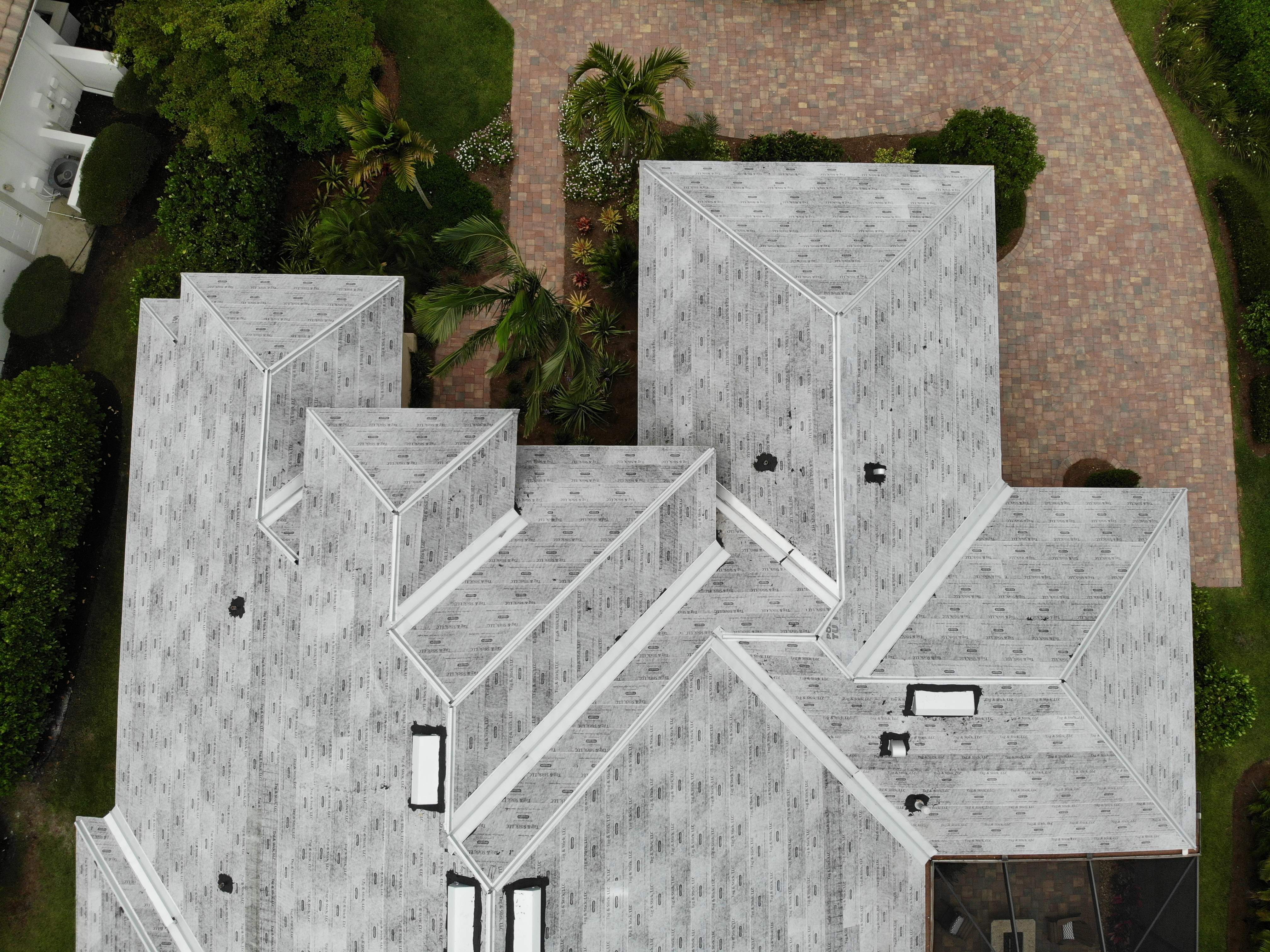 Residential Roofing Installation using Composite Spanish Tile by International Roofing